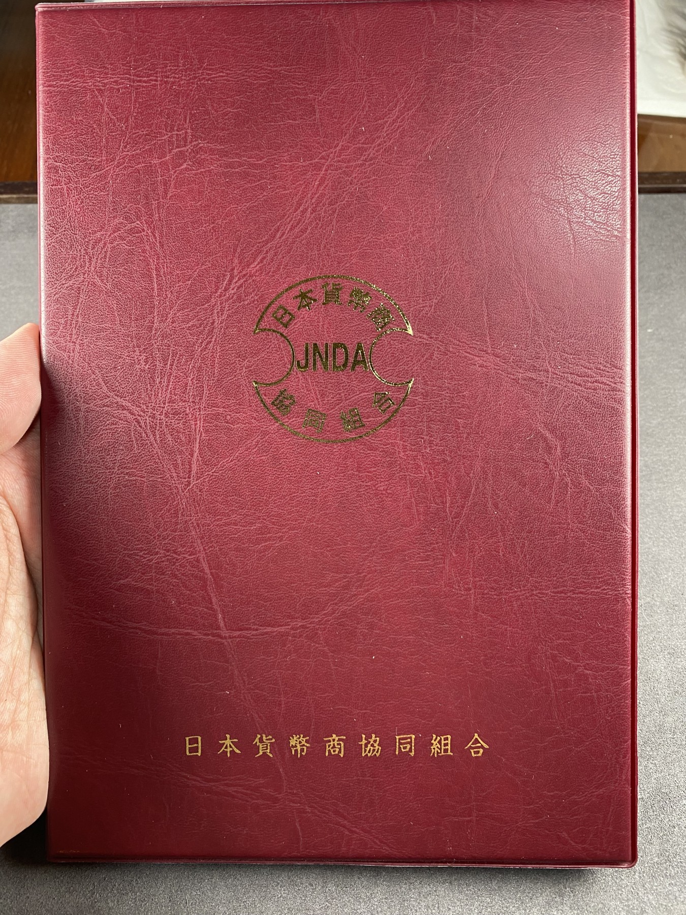 万国钱币拍卖第014期（奢华币宴第一季） 1876年日本明治九年贸易银龙洋1元 带有日本JNDA鉴定书 底板有PL镜面效果
