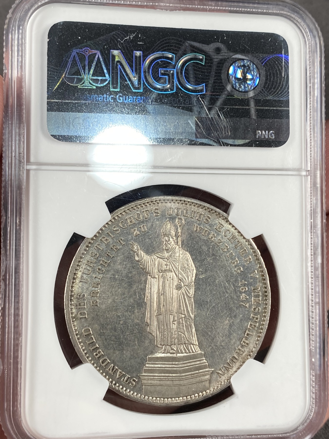 万国钱币拍卖第014期（奢华币宴第一季） NGC MS61 1847年德国巴伐利亚路德维希一世大主教纪念2泰勒 历史泰勒中的经典之作 正面蓝色包浆 背面银霜感十足 高点几近完美，61分只能说智者见智
