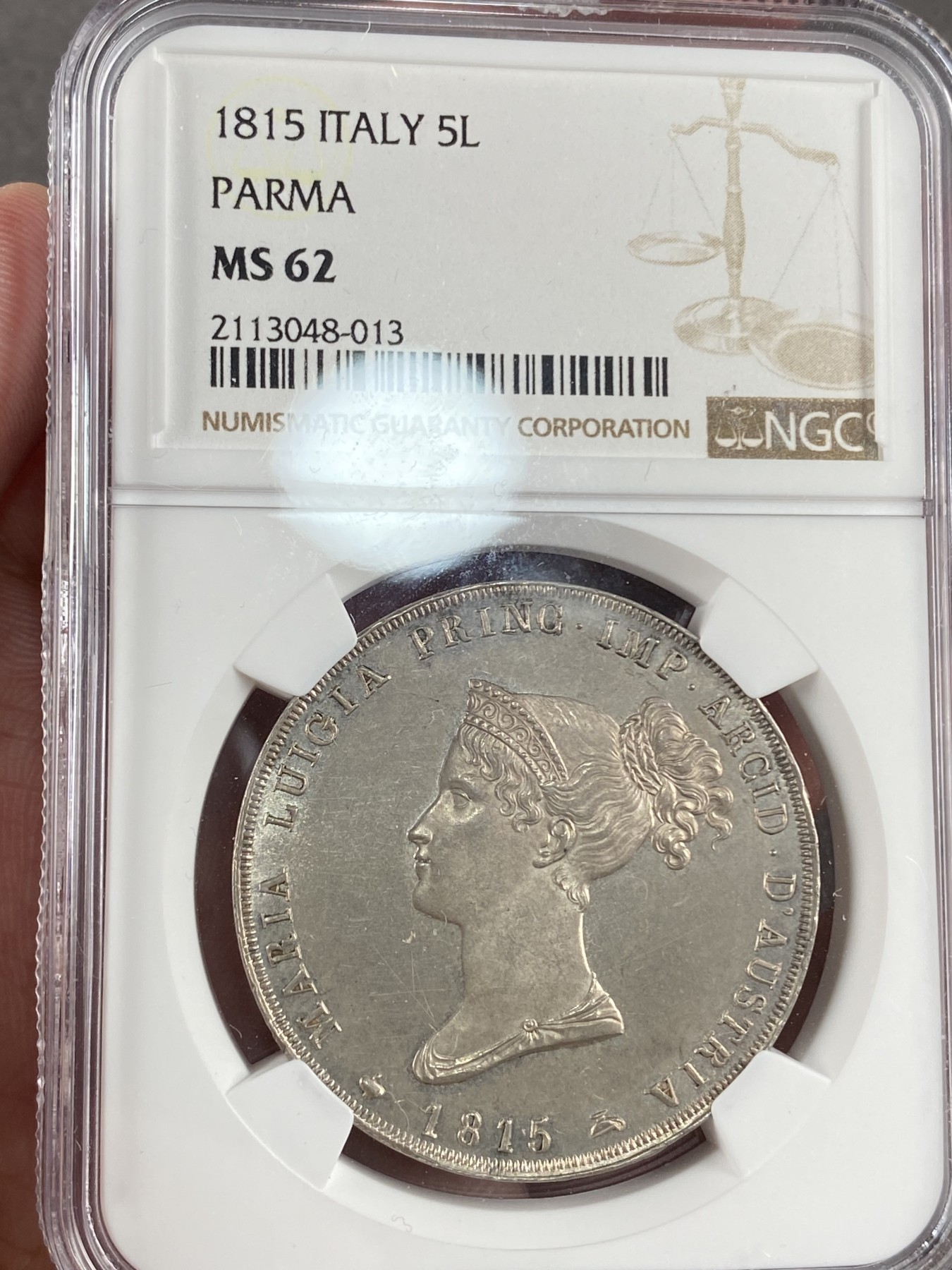 万国钱币拍卖第014期（奢华币宴第一季） NGC MS62 意大利1815年帕尔马5里拉，正面肖像为帕尔马女大公拿破仑夫人玛利亚露易斯，背面为帕尔马公国繁复华丽的纹章，类镜面质感，非常美丽。