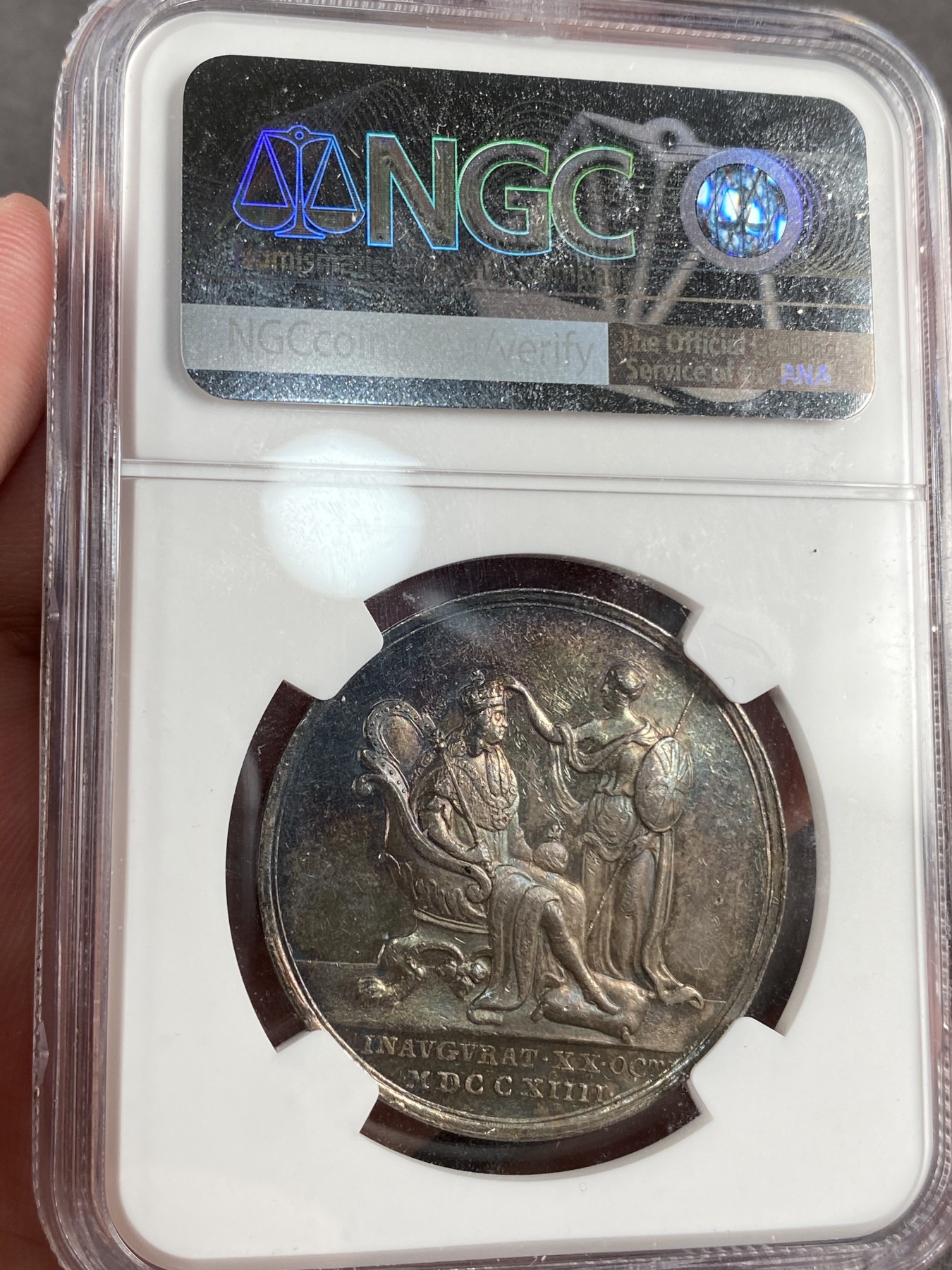 万国钱币拍卖第014期（奢华币宴第一季） NGC MS61 1714年英国汉诺威王朝乔治一世加冕纪念银章 幻五彩 高浮雕 经典品种