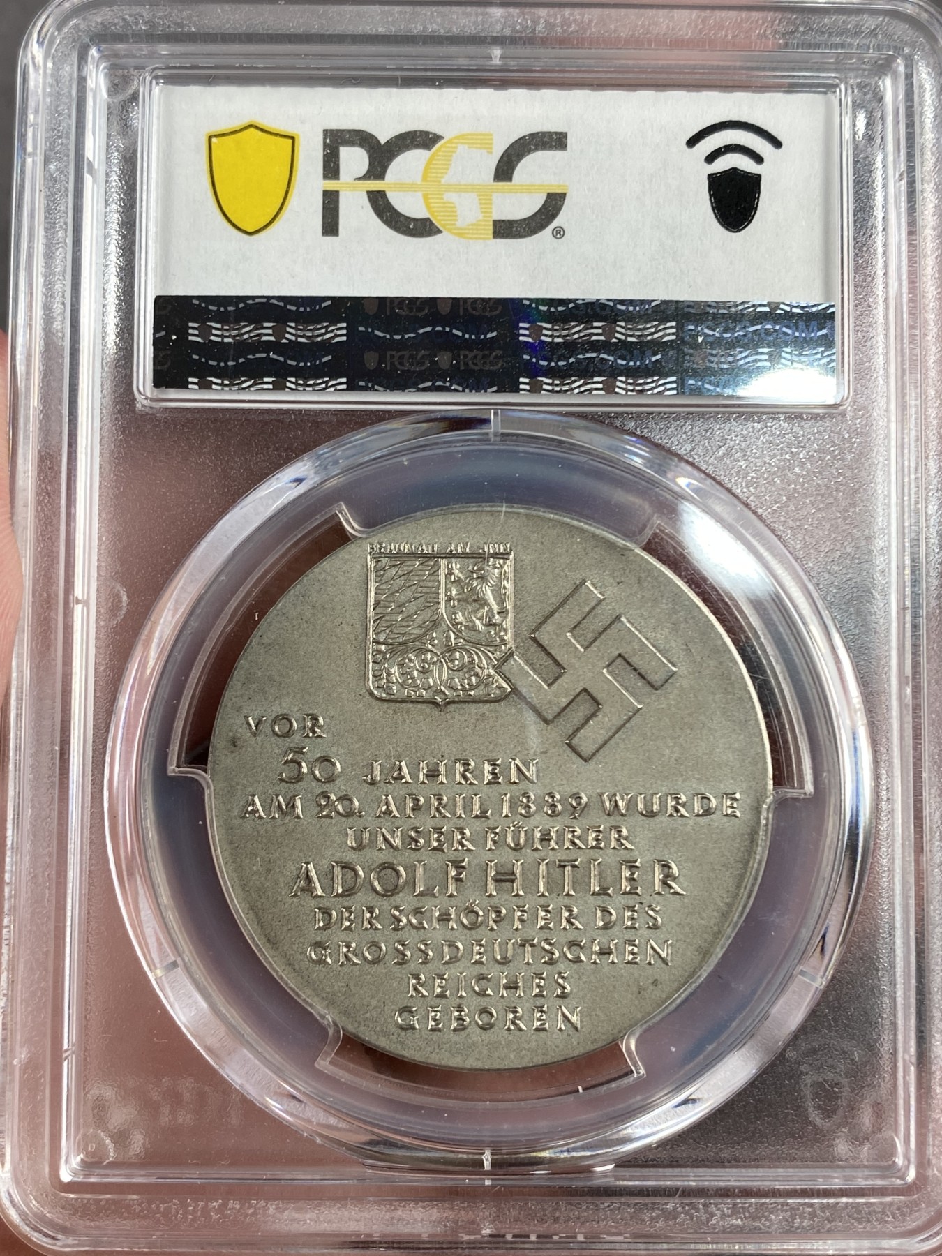 万国钱币拍卖第014期（奢华币宴第一季） PCGS SP63 1939年德国扛把子50大寿纪念银章 经典品种 淡彩转光