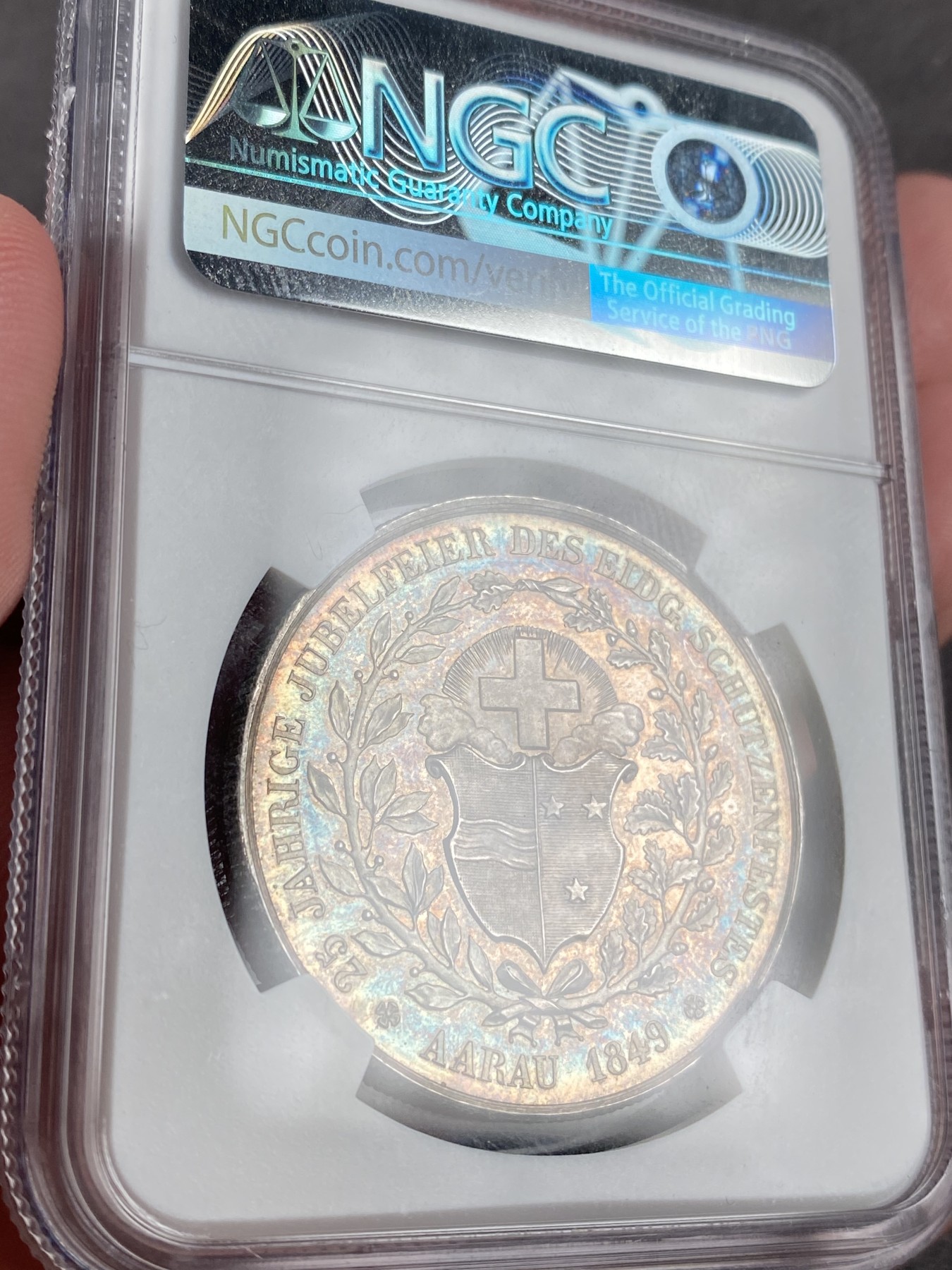 万国钱币拍卖第014期（奢华币宴第一季） NGC MS64 1849瑞士阿尔高射击节银章 高分镜面五彩难得