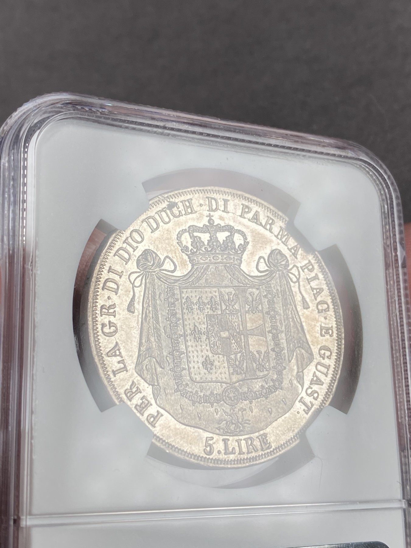 万国钱币拍卖第014期（奢华币宴第一季） NGC MS62 意大利1815年帕尔马5里拉，正面肖像为帕尔马女大公拿破仑夫人玛利亚露易斯，背面为帕尔马公国繁复华丽的纹章，类镜面质感，非常美丽。