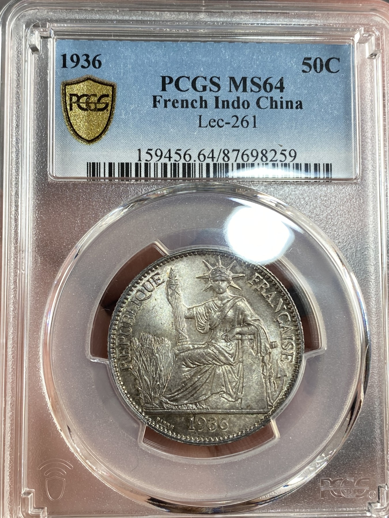 万国钱币拍卖第014期（奢华币宴第一季） PCGS MS64 1936年法属印支50分银币 无论是包浆还是车轮光 此枚都有令人兴奋的表现