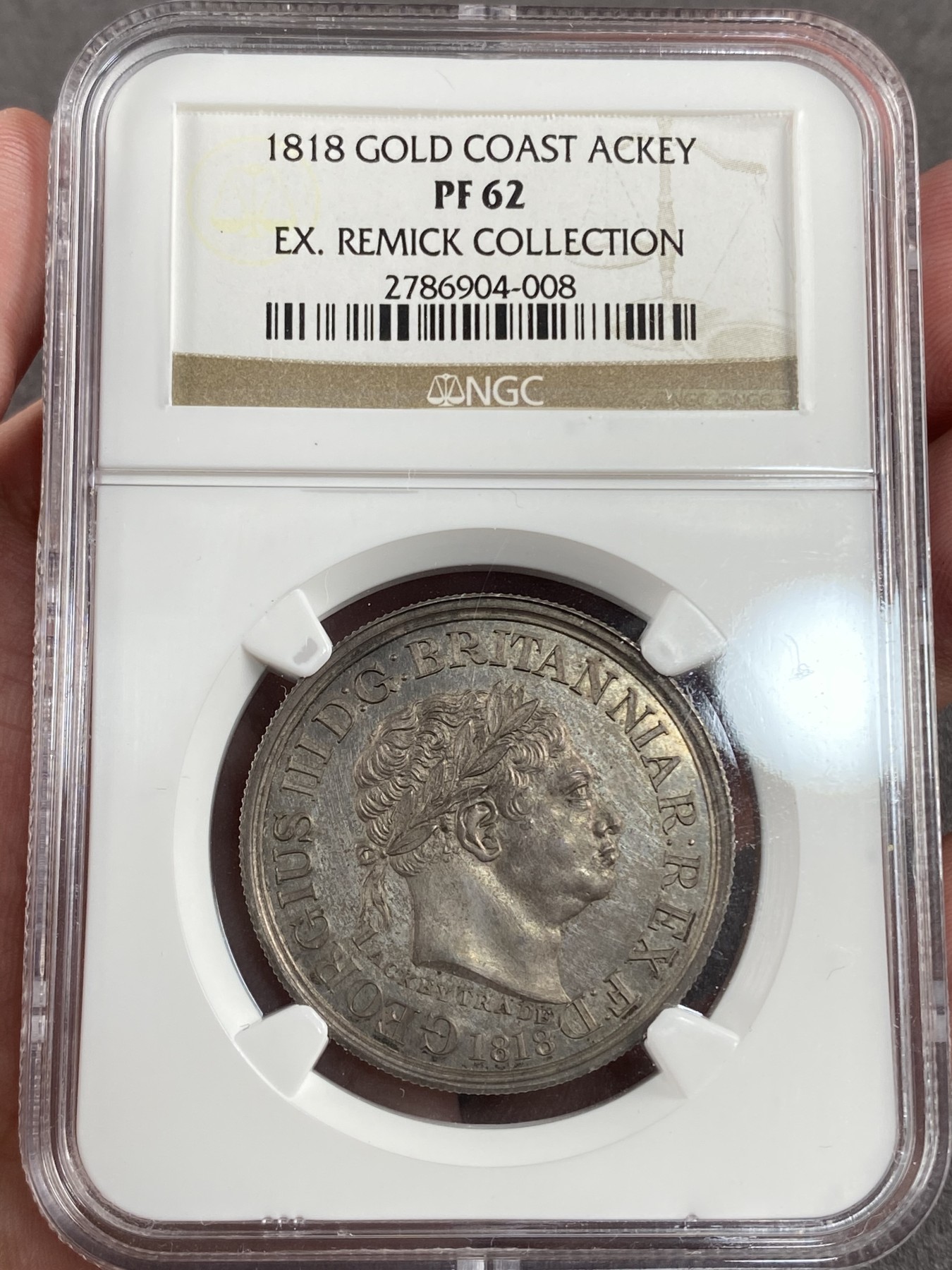 万国钱币拍卖第014期（奢华币宴第一季） NGC PF62 1818年英属精制黄金海岸乔治三世1阿基，名誉经典品种，普制发行量1085，精制不详，但可以肯定是非常稀少的存在，很多年前就是贵价品种，各类大拍几乎绝迹，原味包浆，英属大神Remick旧藏。