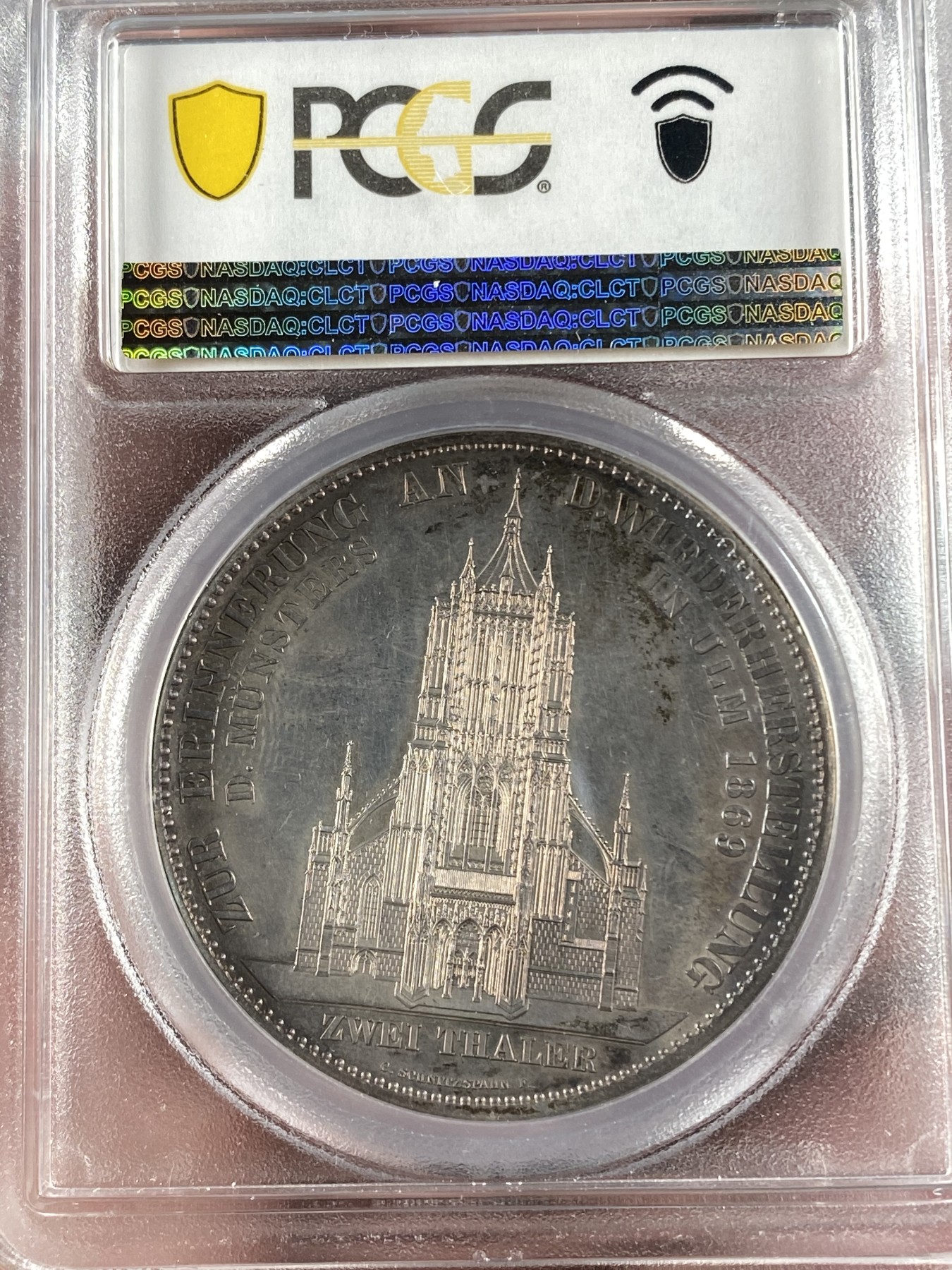 万国钱币拍卖第014期（奢华币宴第一季） PCGS MS63 1869年德国符腾堡经典乌尔姆大教堂竣工纪念2泰勒 联合泰勒经典中的经典 五彩斑斓 1869版发行量只有1700多枚 这样出类拔萃的品种和状态让人无法错过