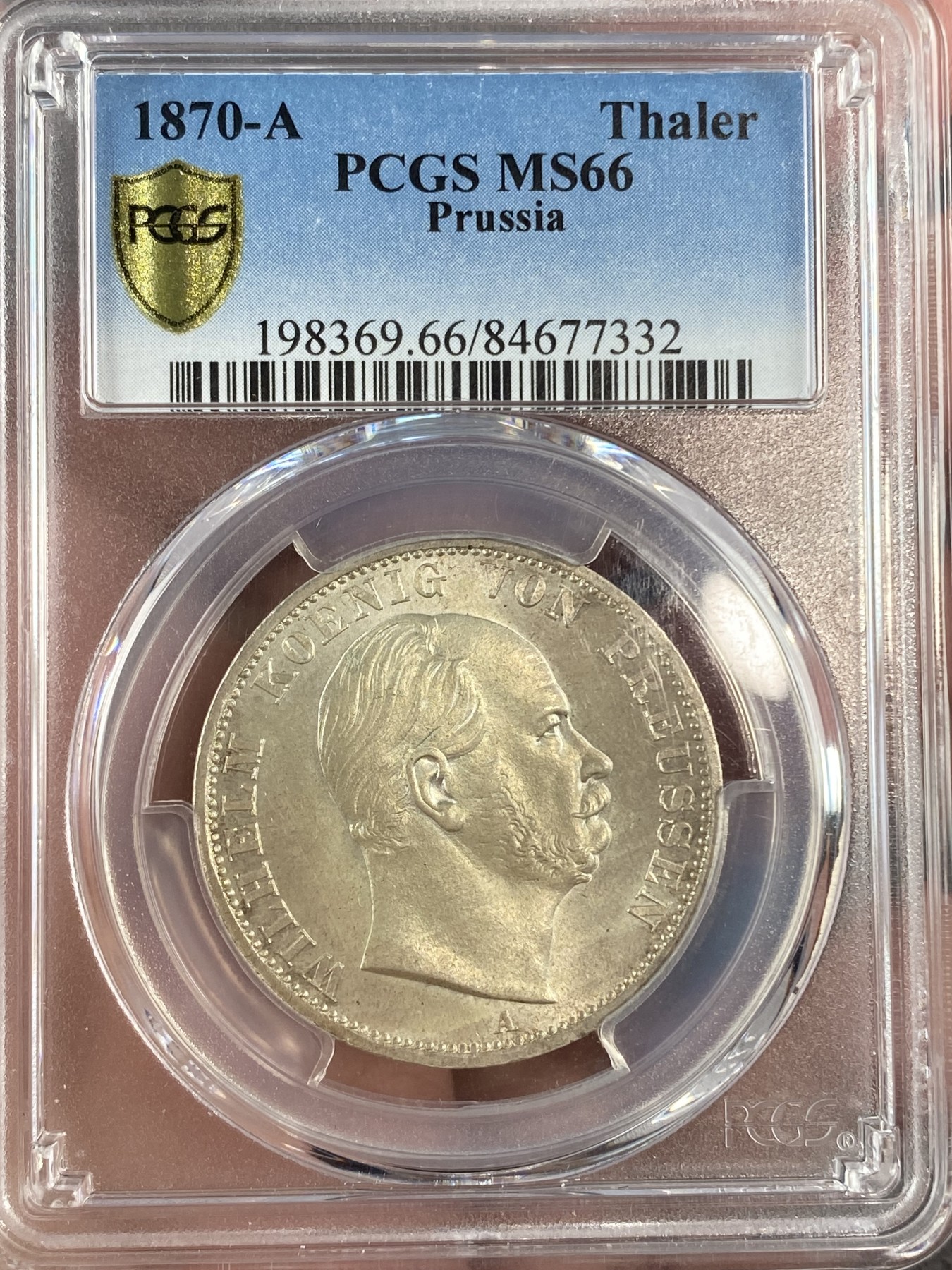 万国钱币拍卖第014期（奢华币宴第一季） PCGS MS66 1870德国普鲁士威廉一世鹰徽1泰勒，流通泰勒高分难度非常之大，PC唯一冠军，今年1月份ha拍卖原物，成交价1200美金。