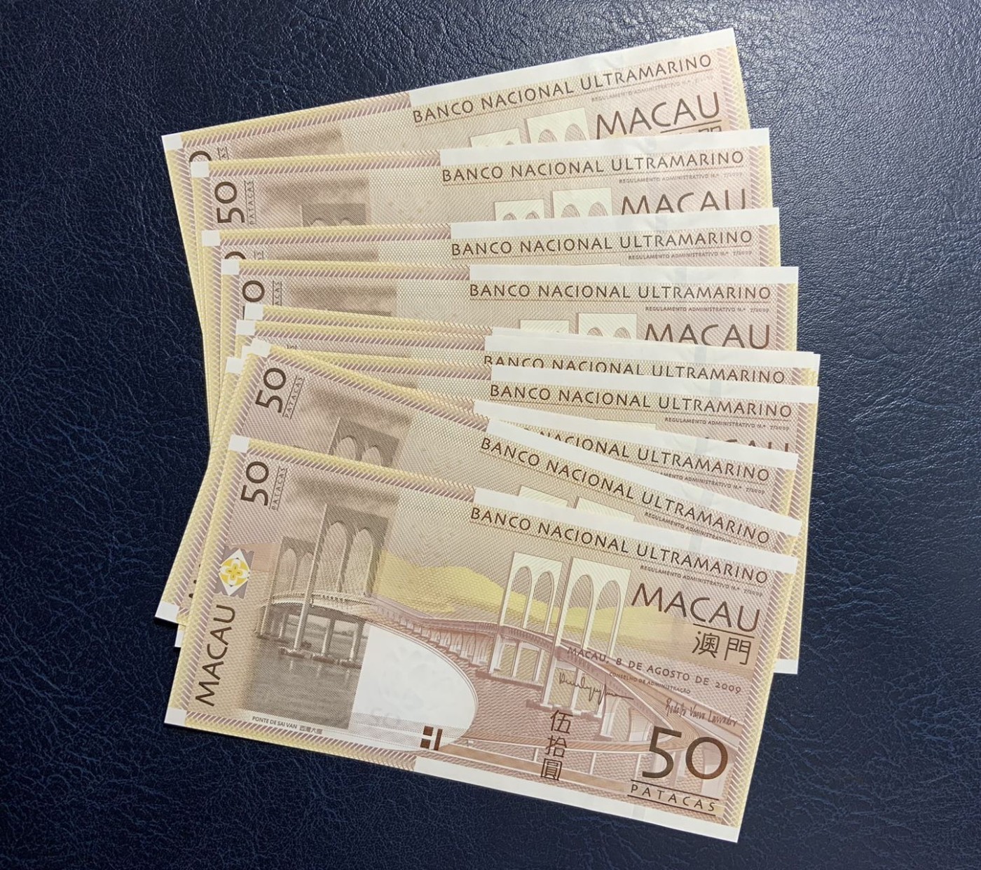收藏联盟Quantum Auction 第283期拍卖  澳门大西洋银行2009年50元首发AA冠十连号 品相全新UNC 有月牙痕和滚轮印 号码无4