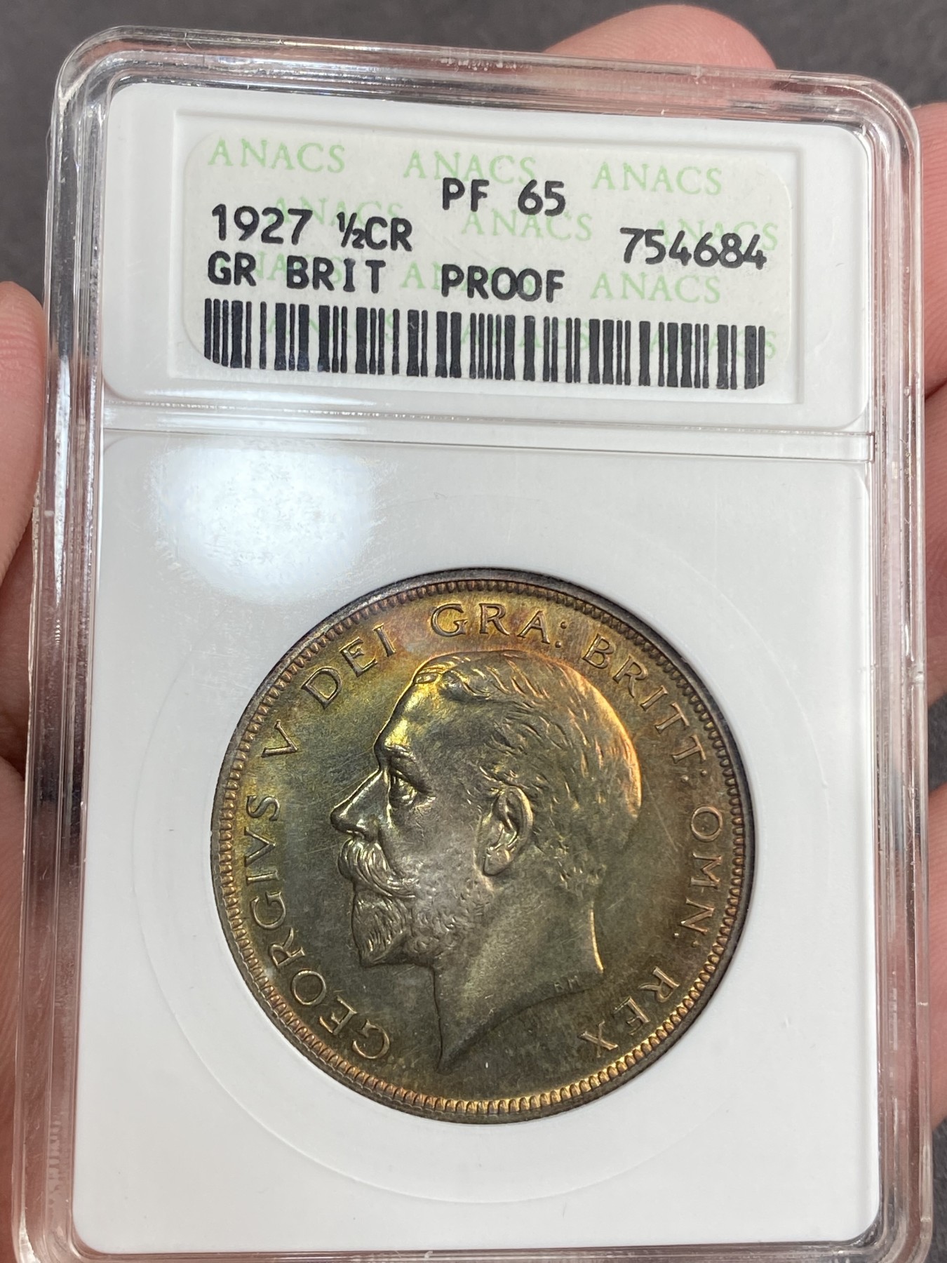 万国钱币拍卖第014期（奢华币宴第一季） ANACS PF65 1927年乔治五世半克朗银币 五彩镜面 经典小白盒 换盒问题不大 几乎过手的小白盒换盒最少都+1