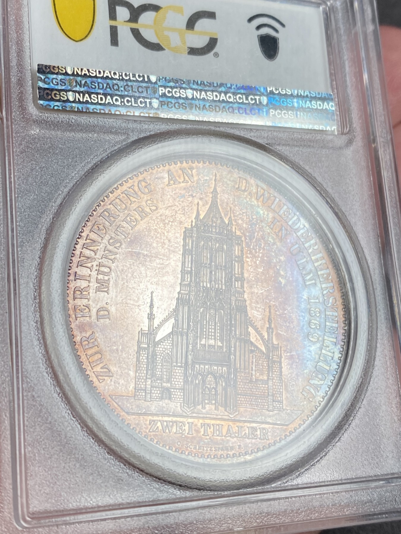 万国钱币拍卖第014期（奢华币宴第一季） PCGS MS63 1869年德国符腾堡经典乌尔姆大教堂竣工纪念2泰勒 联合泰勒经典中的经典 五彩斑斓 1869版发行量只有1700多枚 这样出类拔萃的品种和状态让人无法错过