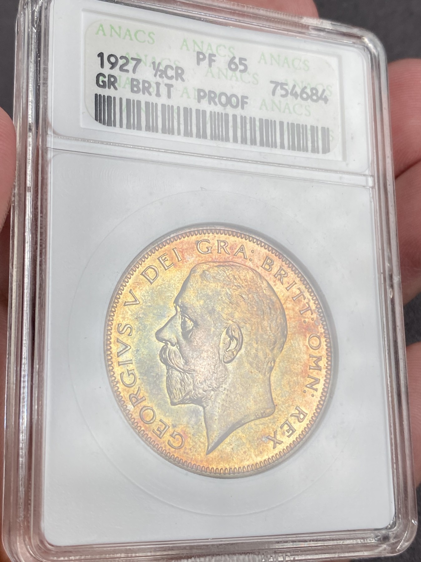 万国钱币拍卖第014期（奢华币宴第一季） ANACS PF65 1927年乔治五世半克朗银币 五彩镜面 经典小白盒 换盒问题不大 几乎过手的小白盒换盒最少都+1