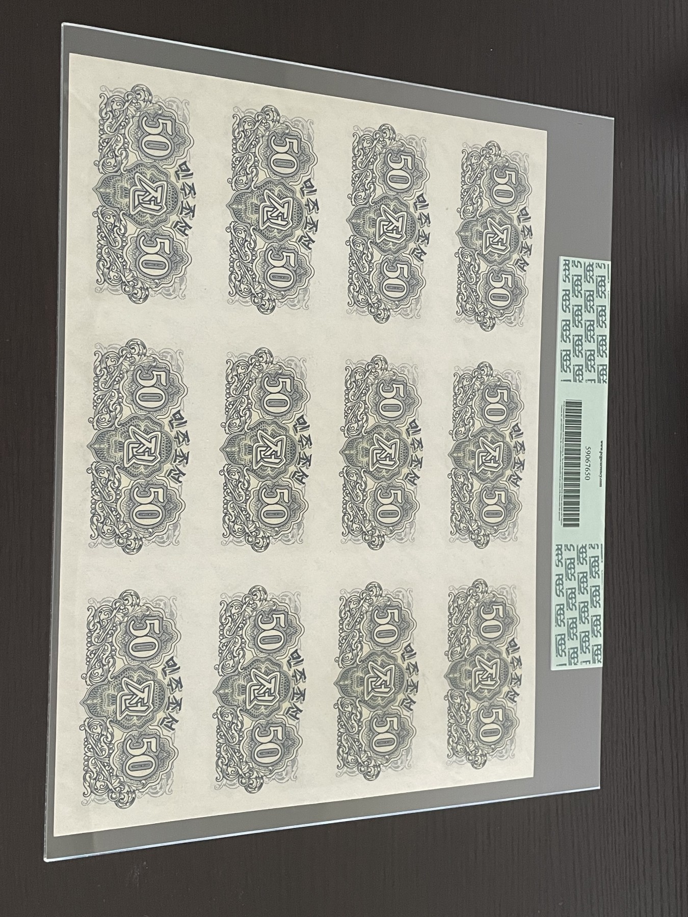 世界各国纸币、朝鲜钞、连体钞、测试钞、套币等专场 【第5场】 朝鲜1947年50钱整版钞12连体，原版水印版 PCGS 58分