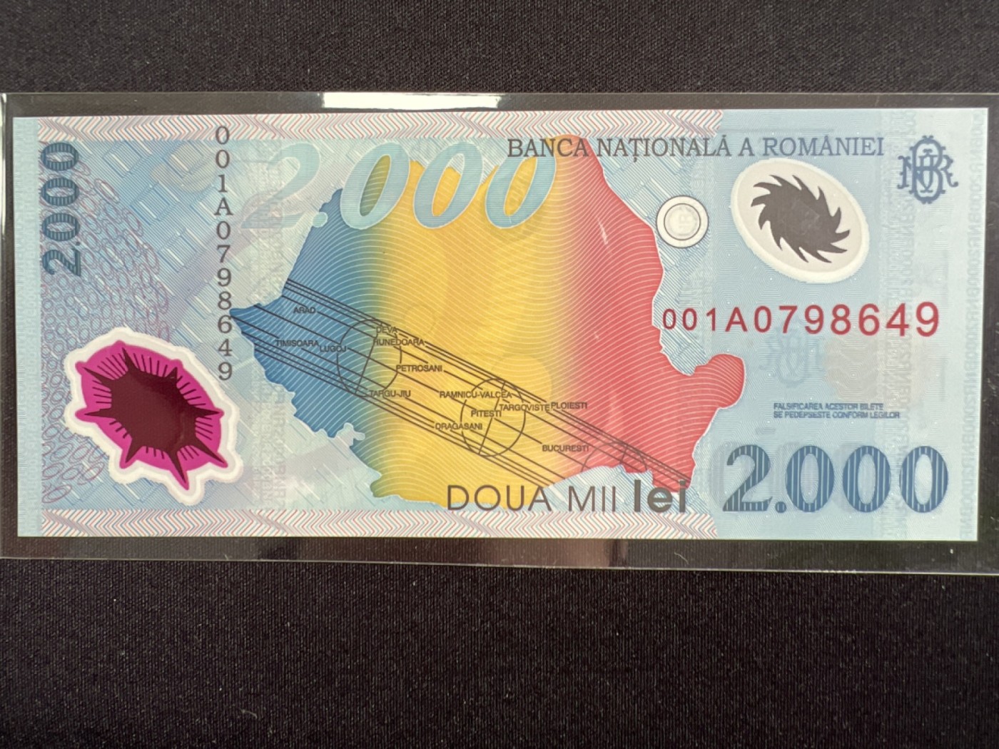 第393期 纸币专场 （无押金，捡漏，全场20包邮，偏远地区除外，接收代拍业务） 罗马尼亚2000列伊塑料钞