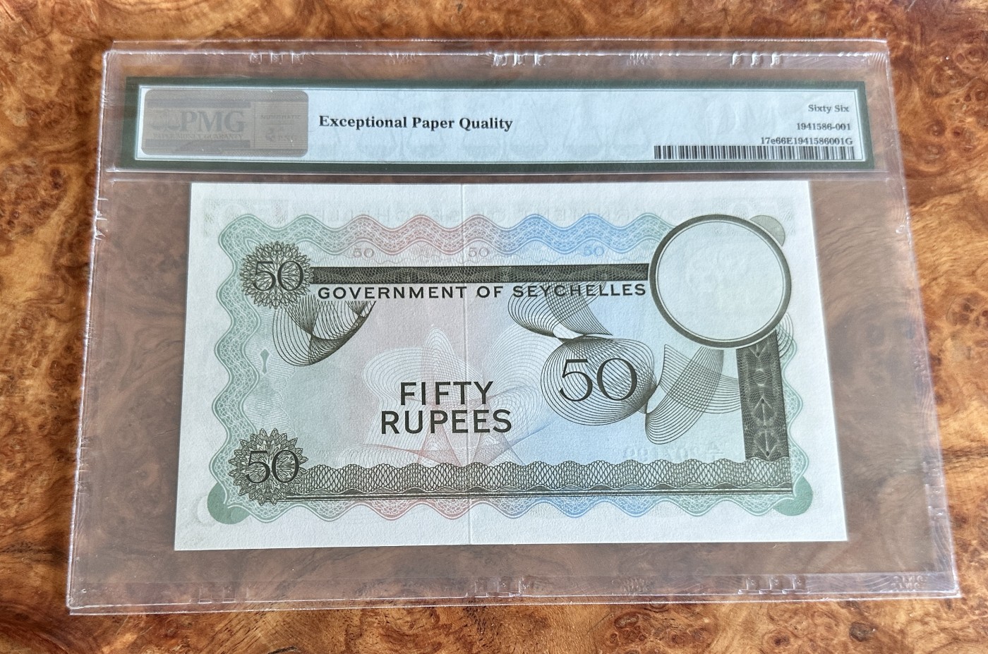 Chase Auction 第24期 - - 外钞、民国钞和人民币混合场！ 1973年塞舌尔50卢比，SEX钞，PMG66！