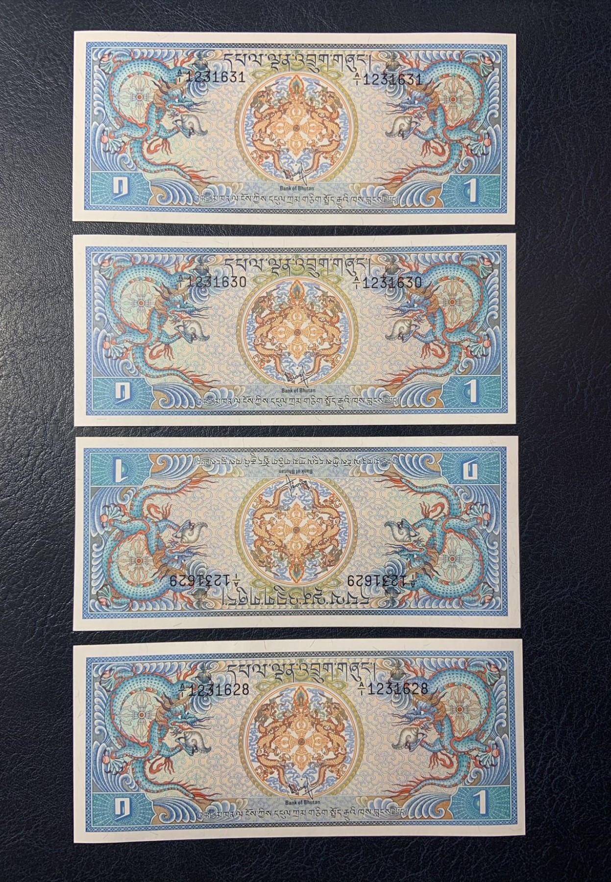 收藏联盟Quantum Auction 第284期拍卖  不丹1981年1努尔特鲁姆4张 品相全新UNC 首发A/1冠号码无4