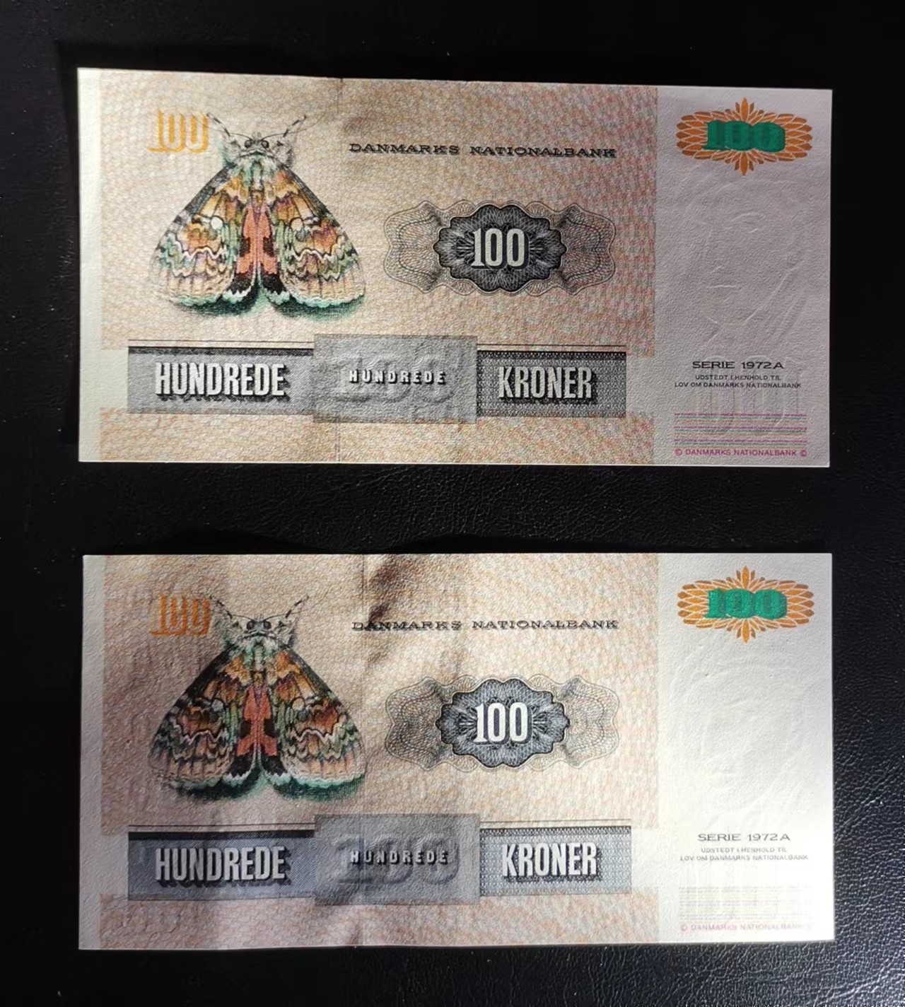 《张总收藏》116期-外币精品荟萃 (2张一组)丹麦1995年F4冠100克朗 Pick#54e(2) / 1995年F0冠100克朗Pick#54项下，2张均为AU品相，测光下有轻微软折