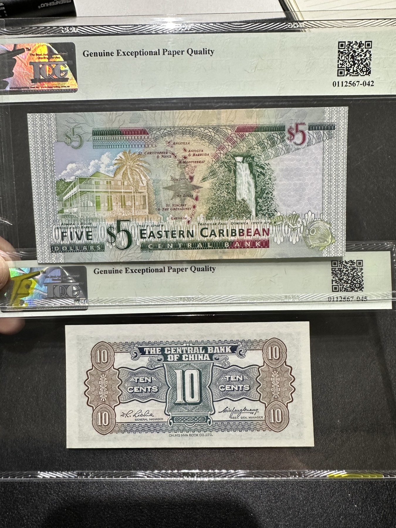 《外钞收藏家》第二百九十五期（连拍第三场） 东加勒比+民国 两张评级一起 TQG评级