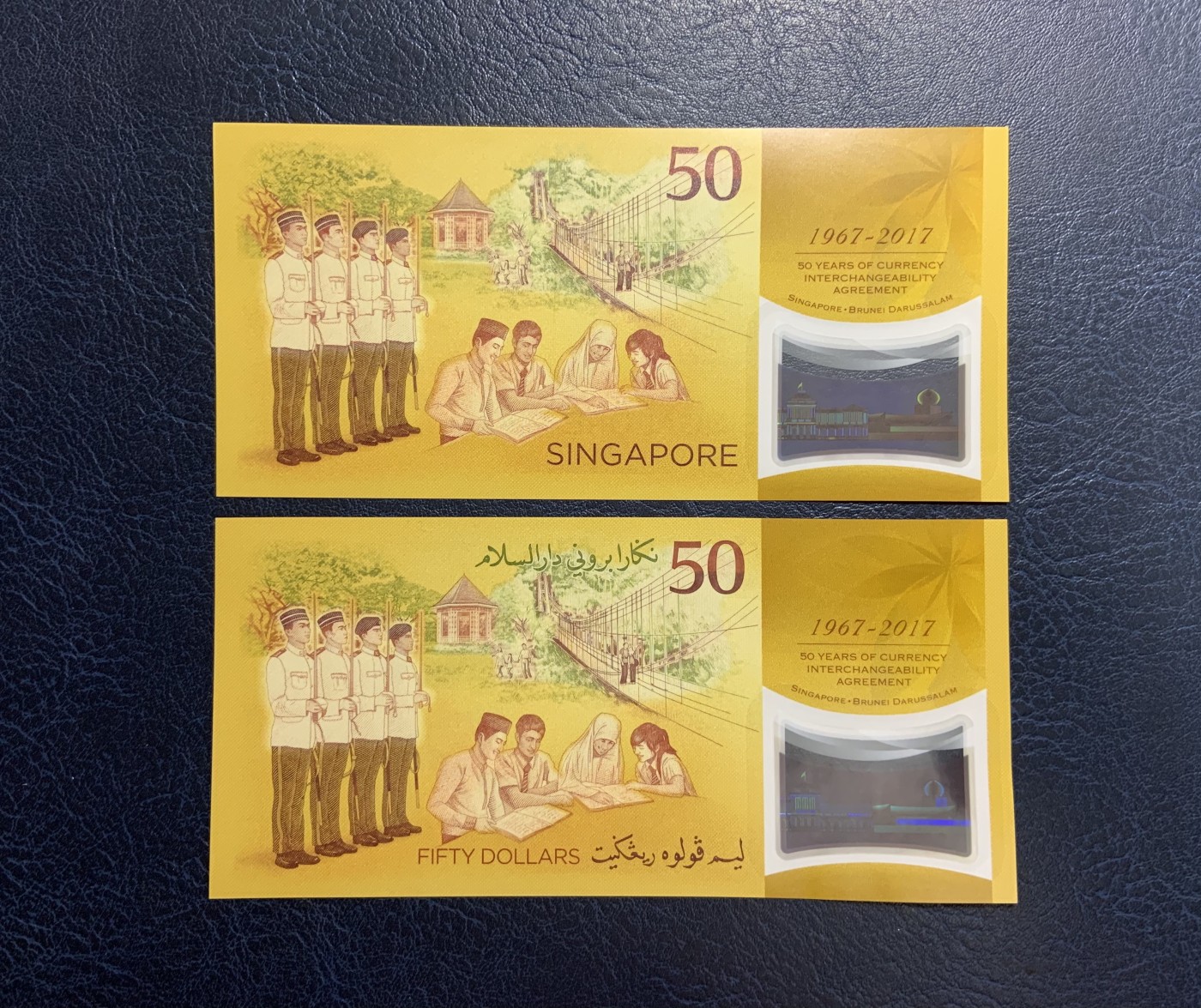 收藏联盟Quantum Auction 第285期拍卖  新加坡和文莱2017年货币等值50周年纪念钞50元(吉令特) 品相全新UNC  号码无47