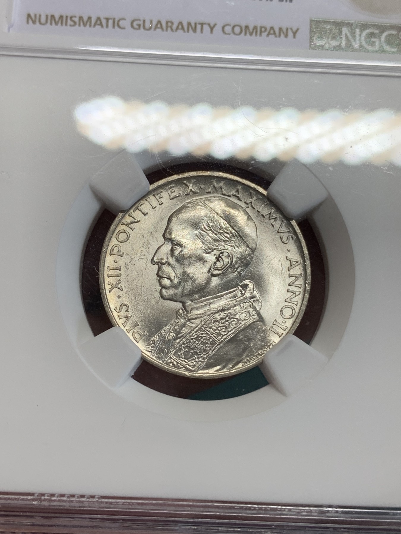 《竞宝斋》第192场-周日，周一 2场 (全场包邮) NGC-MS61 梵蒂冈1940年5里拉小船银币 转光明显