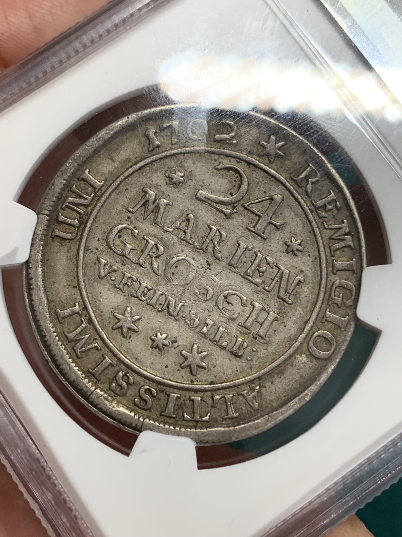 《竞宝斋》第192场-周日，周一 2场 (全场包邮) NGC XF45（第5名）德国不伦瑞克1702年野人24M(2/3泰勒)300多年的银币 眉目清晰 色泽均匀。