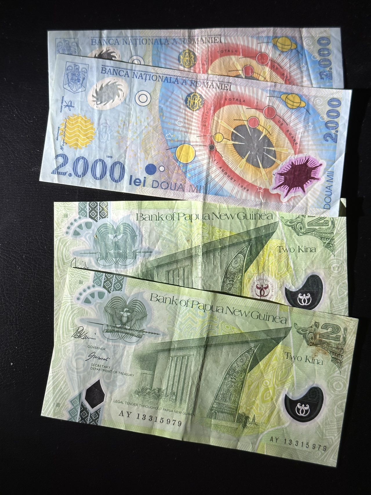 八月最后一场，第十五期大拍 （S1）一组4张，新几内亚和罗马尼亚，均为塑料钞，其中罗马尼亚为纪念钞