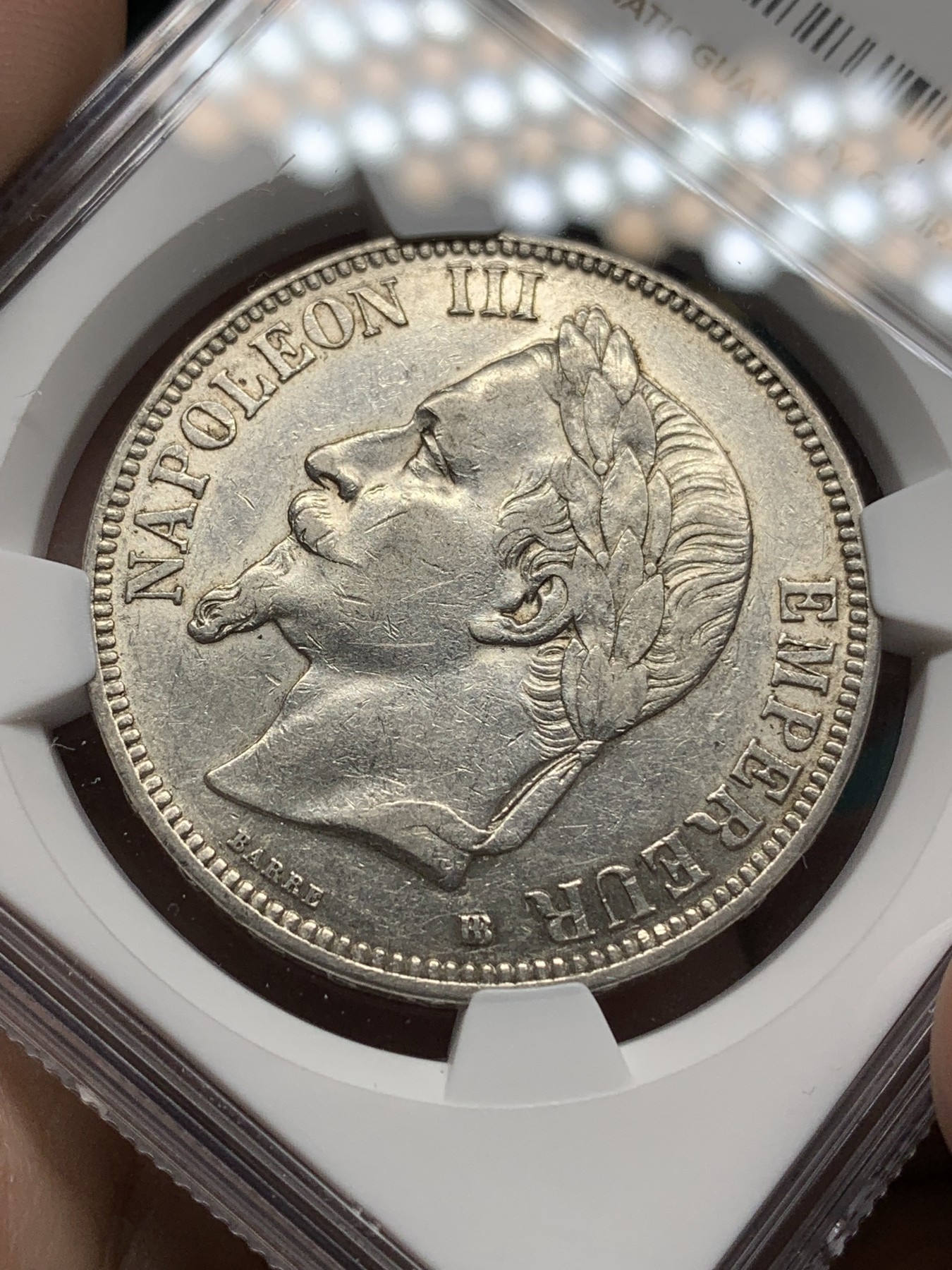 《竞宝斋》第192场-周日，周一 2场 (全场包邮) NGC AU50 法国 1869年BB版拿三5法郎银币 带底光 非常好