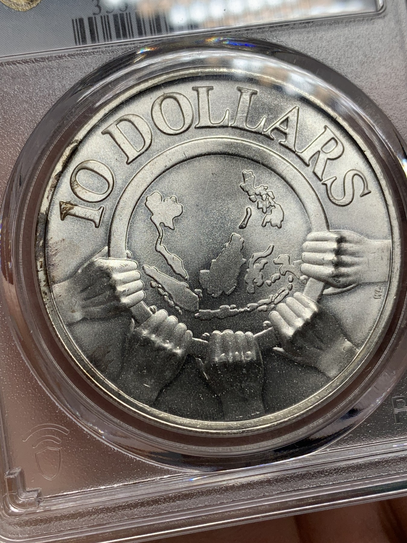 《竞宝斋》第192场-周日，周一 2场 (全场包邮) PCGS MS66 新加坡1977年东盟10周年银币