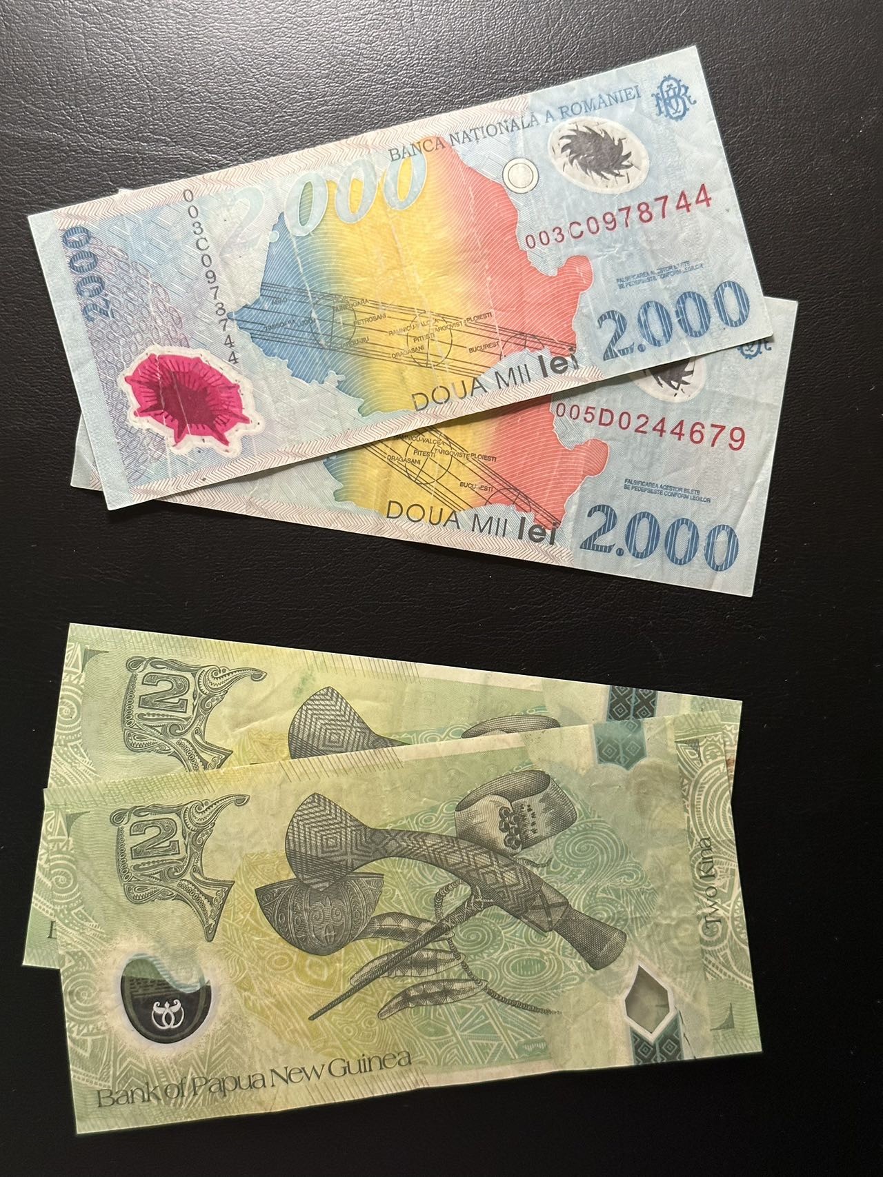 八月最后一场，第十五期大拍 （S1）一组4张，新几内亚和罗马尼亚，均为塑料钞，其中罗马尼亚为纪念钞