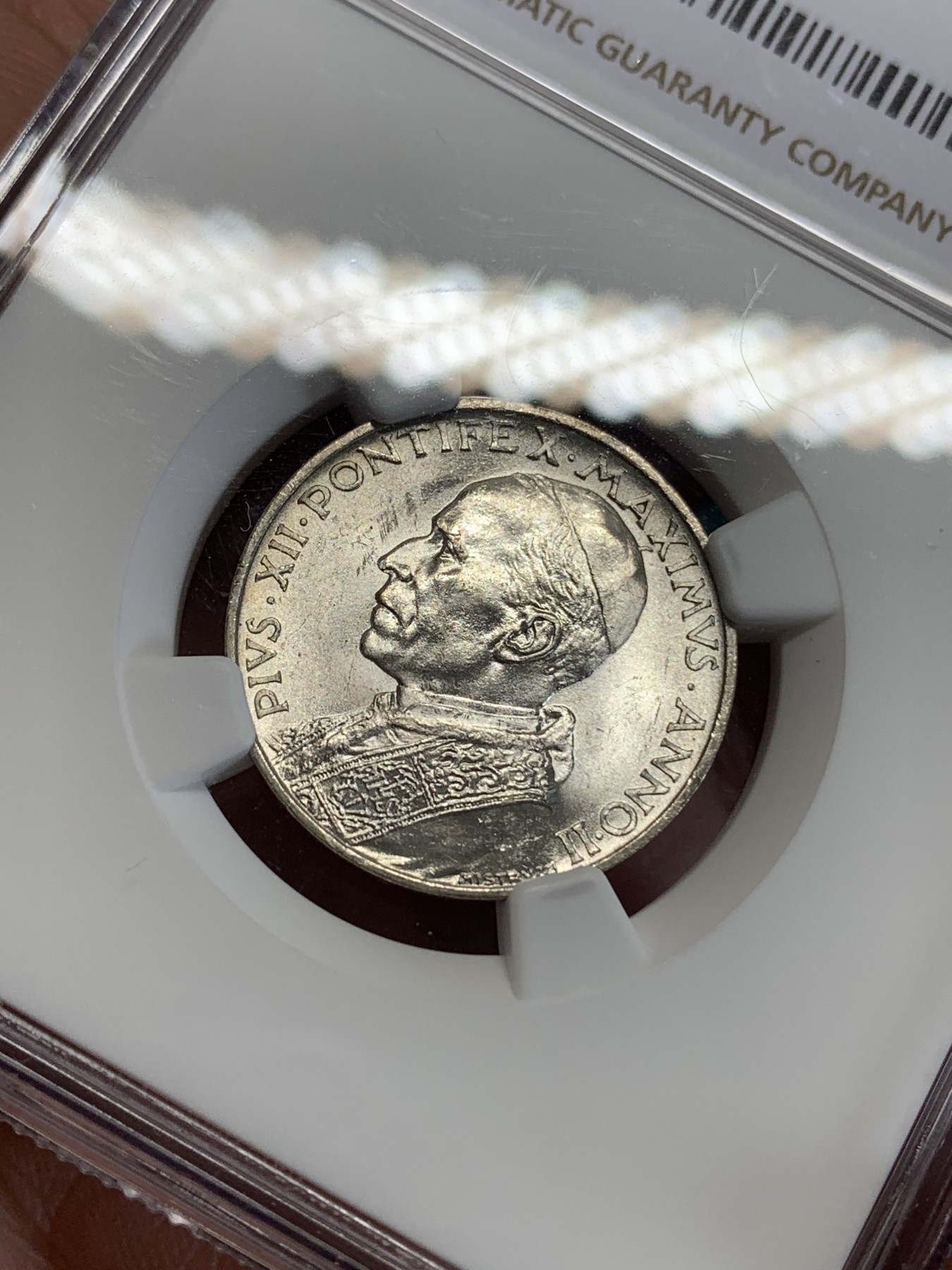 《竞宝斋》第192场-周日，周一 2场 (全场包邮) NGC-MS61 梵蒂冈1940年5里拉小船银币 转光明显