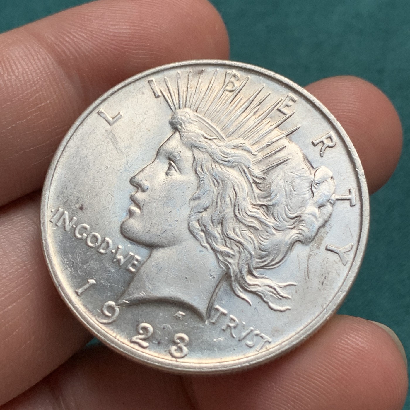 《竞宝斋》第192场-周日，周一 2场 (全场包邮) 美国和平银币1923年d版 ，unc品相。丹佛厂发行量仅为普版的五分之一，62分pcgs指导价200美金。