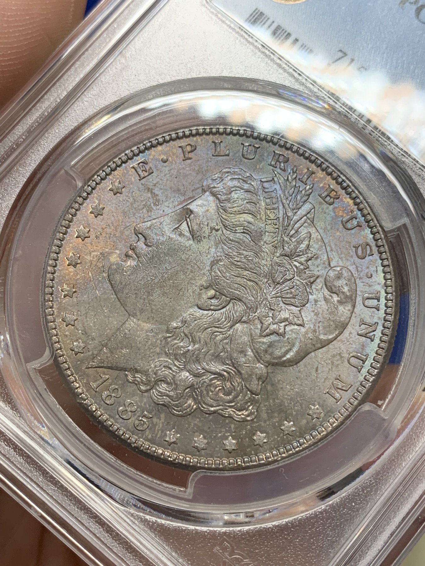 《竞宝斋》第193场-周日，周一 2场 (全场包邮) PCGS-MS63 美国 1885年 1美元 摩根银币 正面五彩包浆 很漂亮