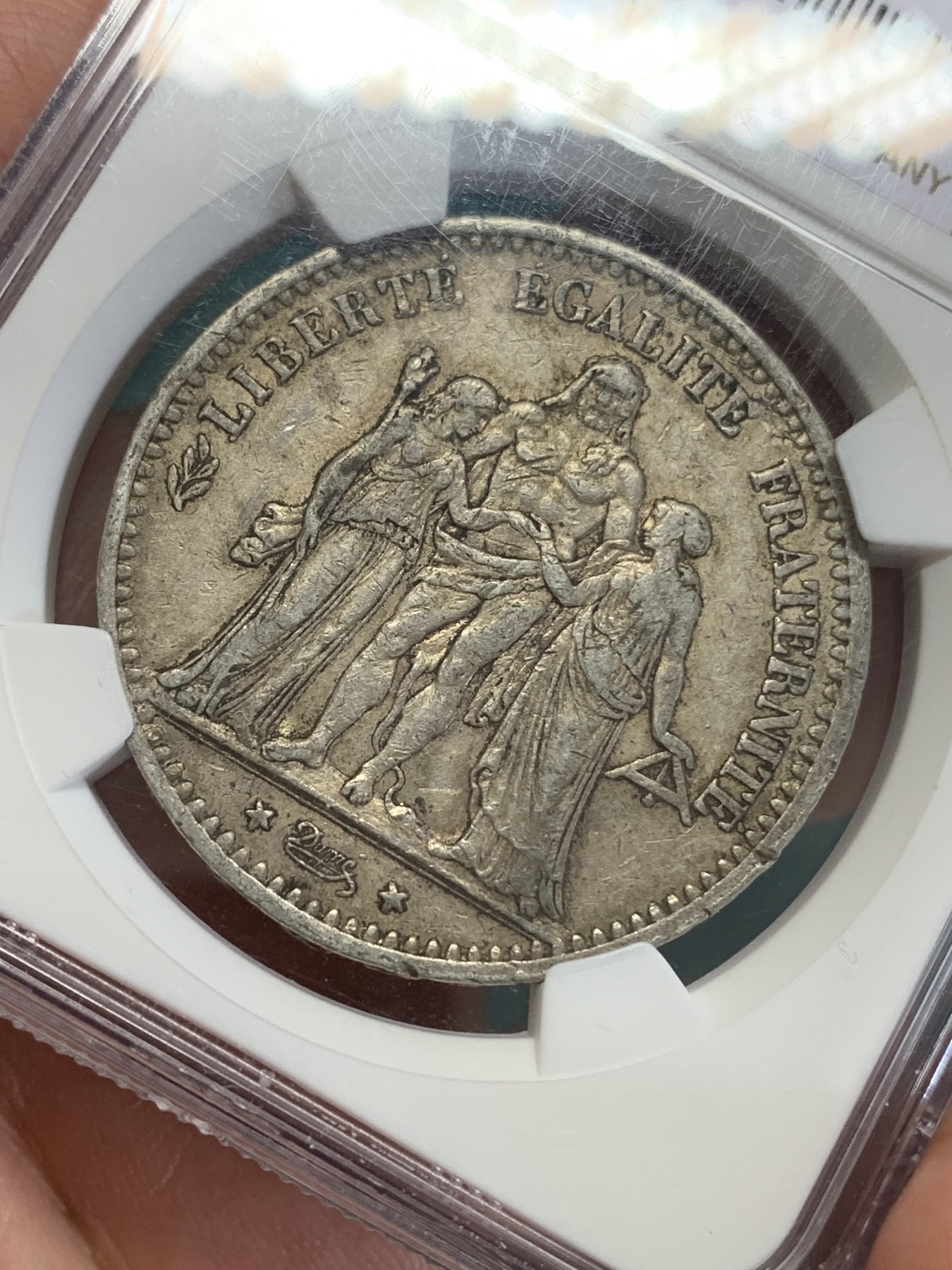 《竞宝斋》第193场-周日，周一 2场 (全场包邮) NGC AU55 法国1875年大力神5法郎银币 小A版 铸造量是1873年的1/10