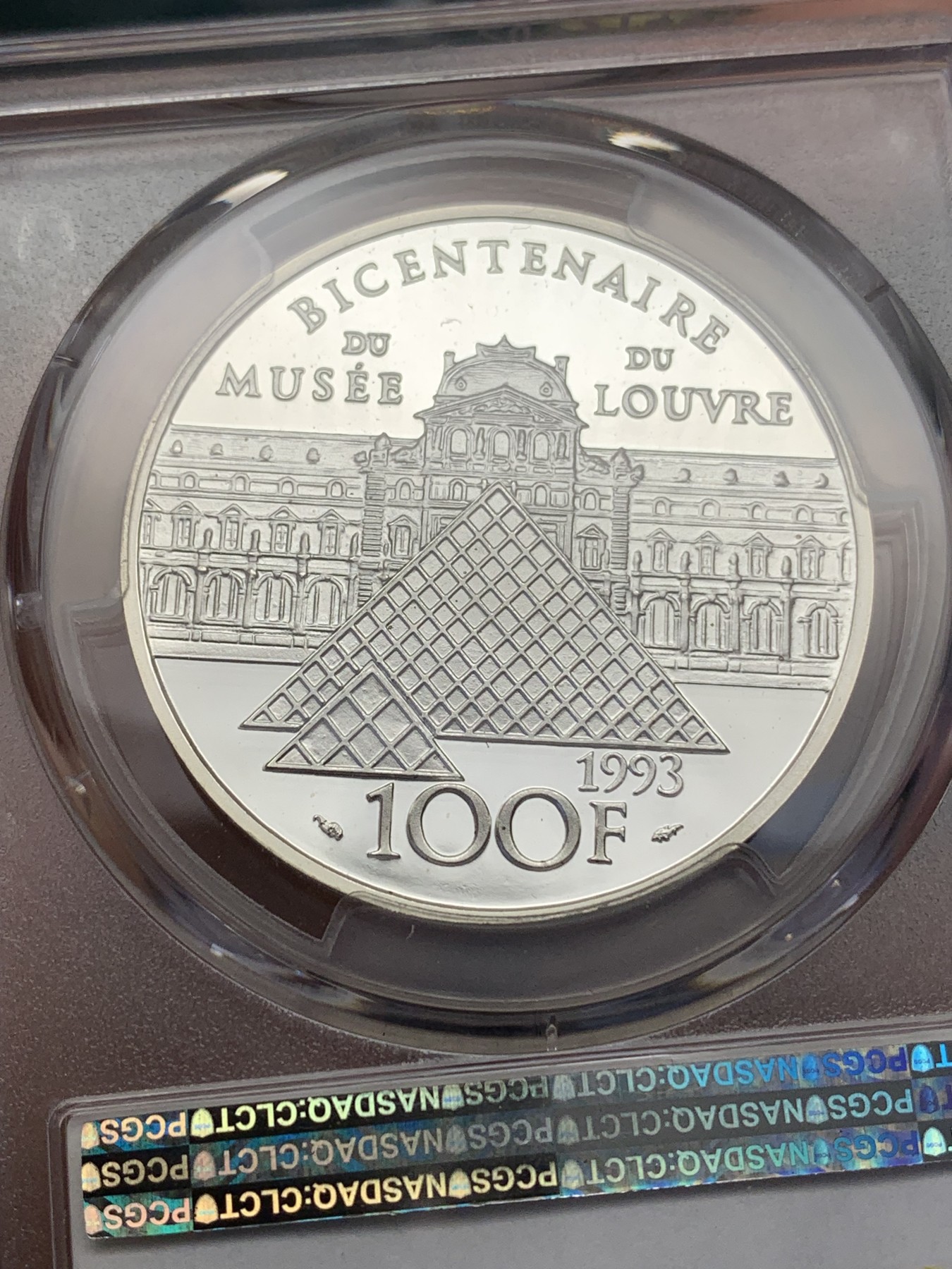 《竞宝斋》第193场-周日，周一 2场 (全场包邮) PCGS-PR69DCAM 冠军分 法国1993年自由引导人民100法郎大银币，自由女神高举旗帜，刻画生动。深度镜面，无暇冠军品质。