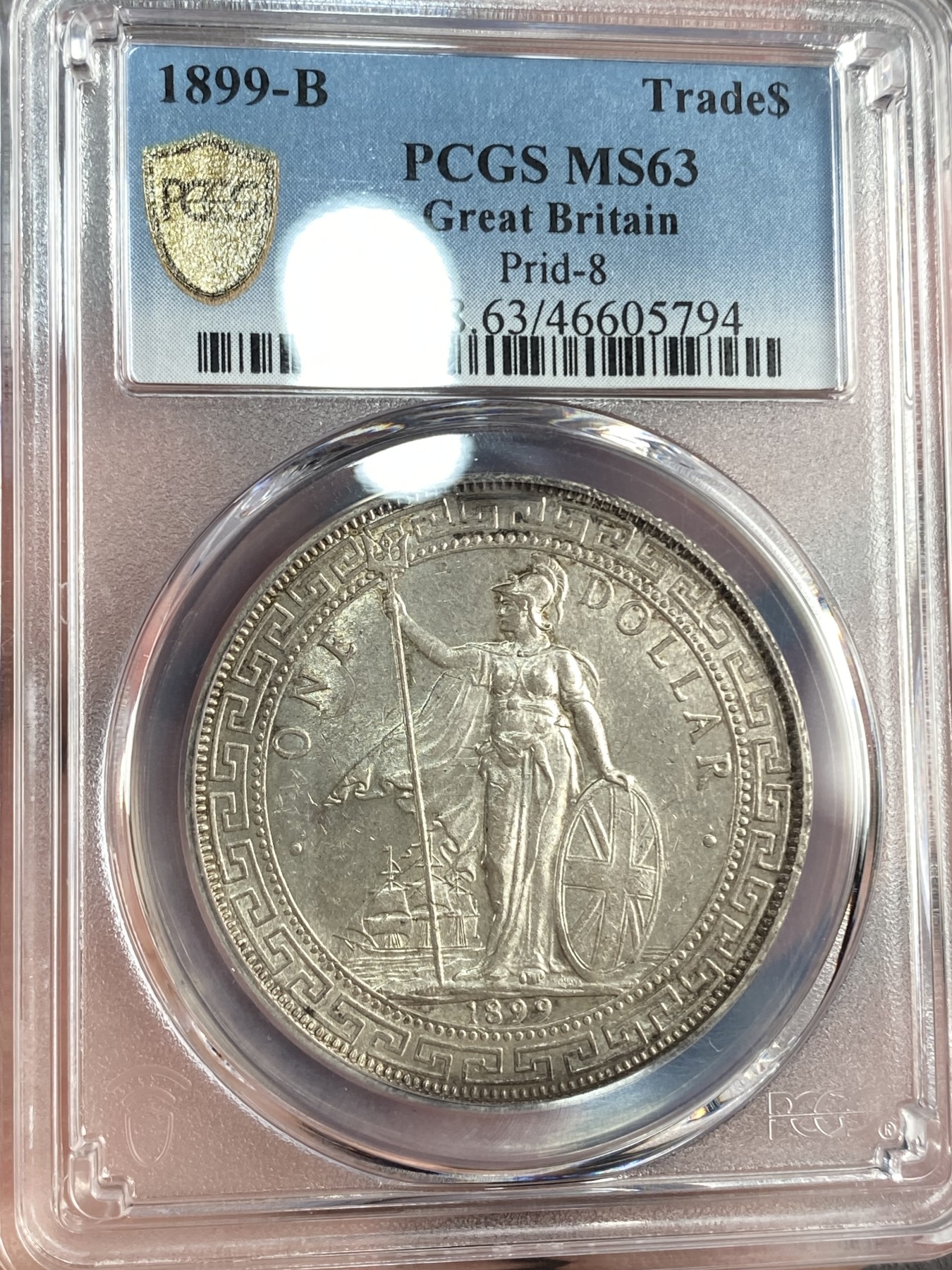 万国钱币拍卖第015期（奢华币章第二季） PCGS MS63 1899年英属站洋1元 经典品种稀少年份 购于欧洲老藏家