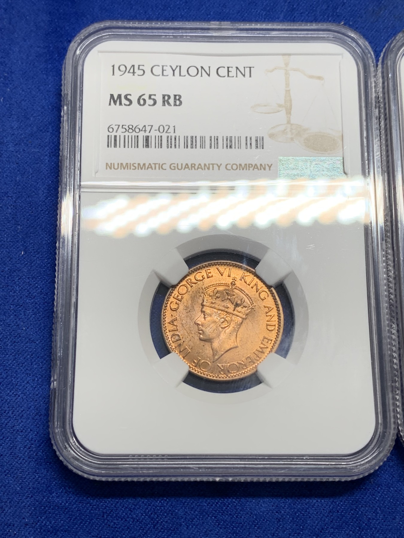 《竞宝斋》第193场-周日，周一 2场 (全场包邮) 3枚一组 NGC-MS62英属南非女王1便士铜币，光度好低评+NGC-MS65英属锡兰乔六1分铜币，高分不多见+NGC-MS63英属东非1先令，好品带分少见