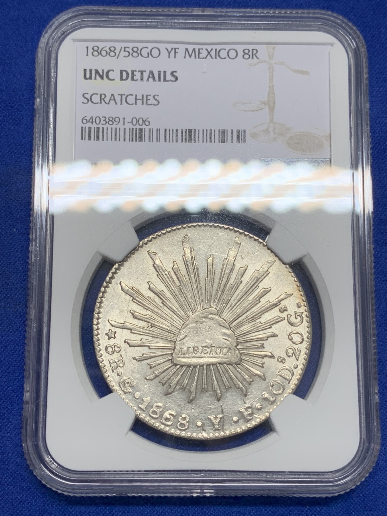 《竞宝斋》第193场-周日，周一 2场 (全场包邮) NGC-UNCD墨西哥1868/58年中期鹰洋 少见骑字版 好状态强转光可惜有道划痕未给分