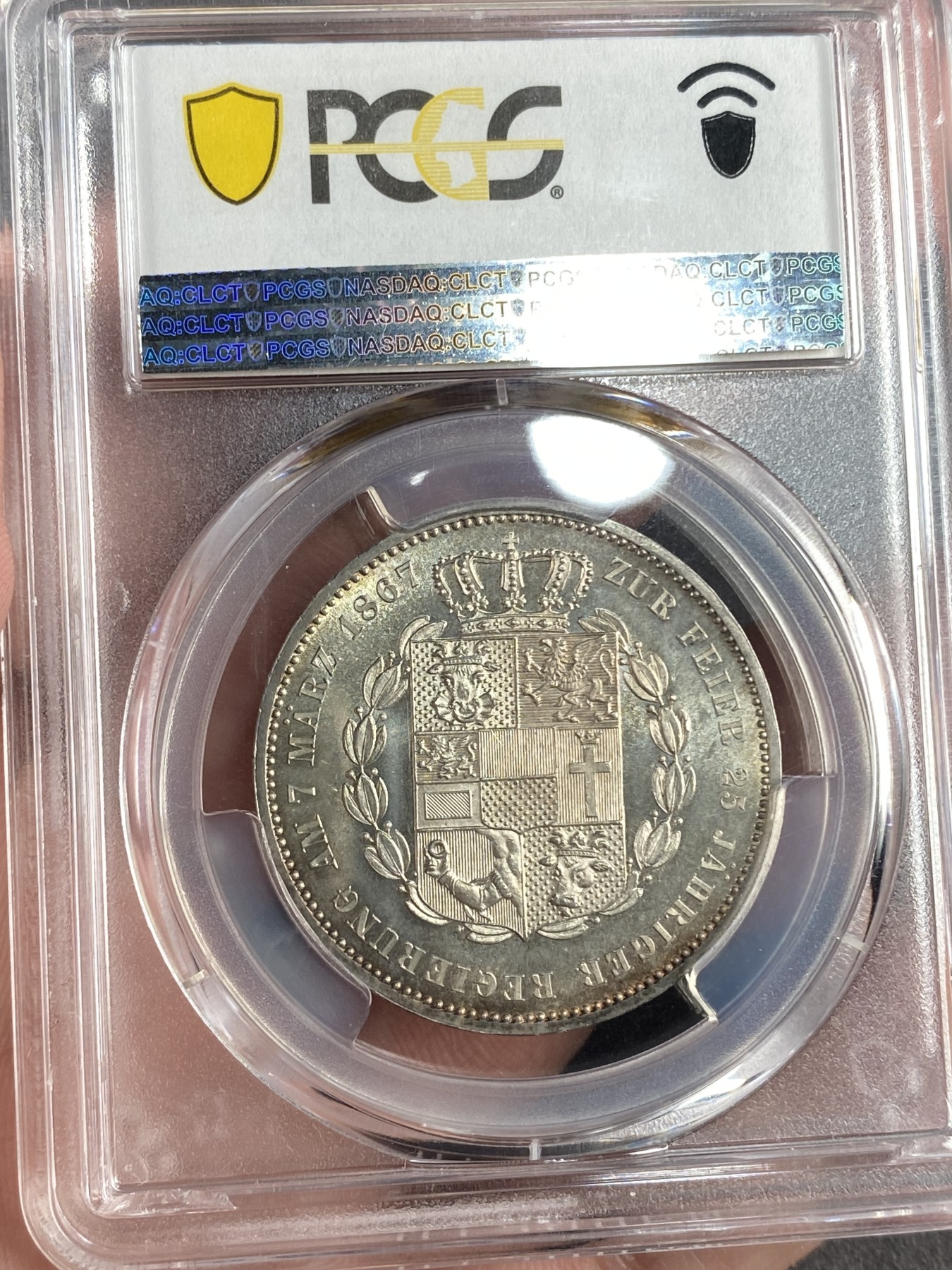 万国钱币拍卖第015期（奢华币章第二季） PCGS MS63 1867年德国梅克伦堡-什未林大公国弗朗茨三世1泰勒 经典小邦盾徽系列 发行量1万枚 无论包浆还是底板的光泽都无与伦比