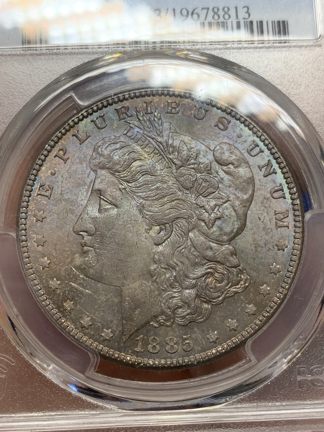 《竞宝斋》第193场-周日，周一 2场 (全场包邮) PCGS-MS63 美国 1885年 1美元 摩根银币 正面五彩包浆 很漂亮