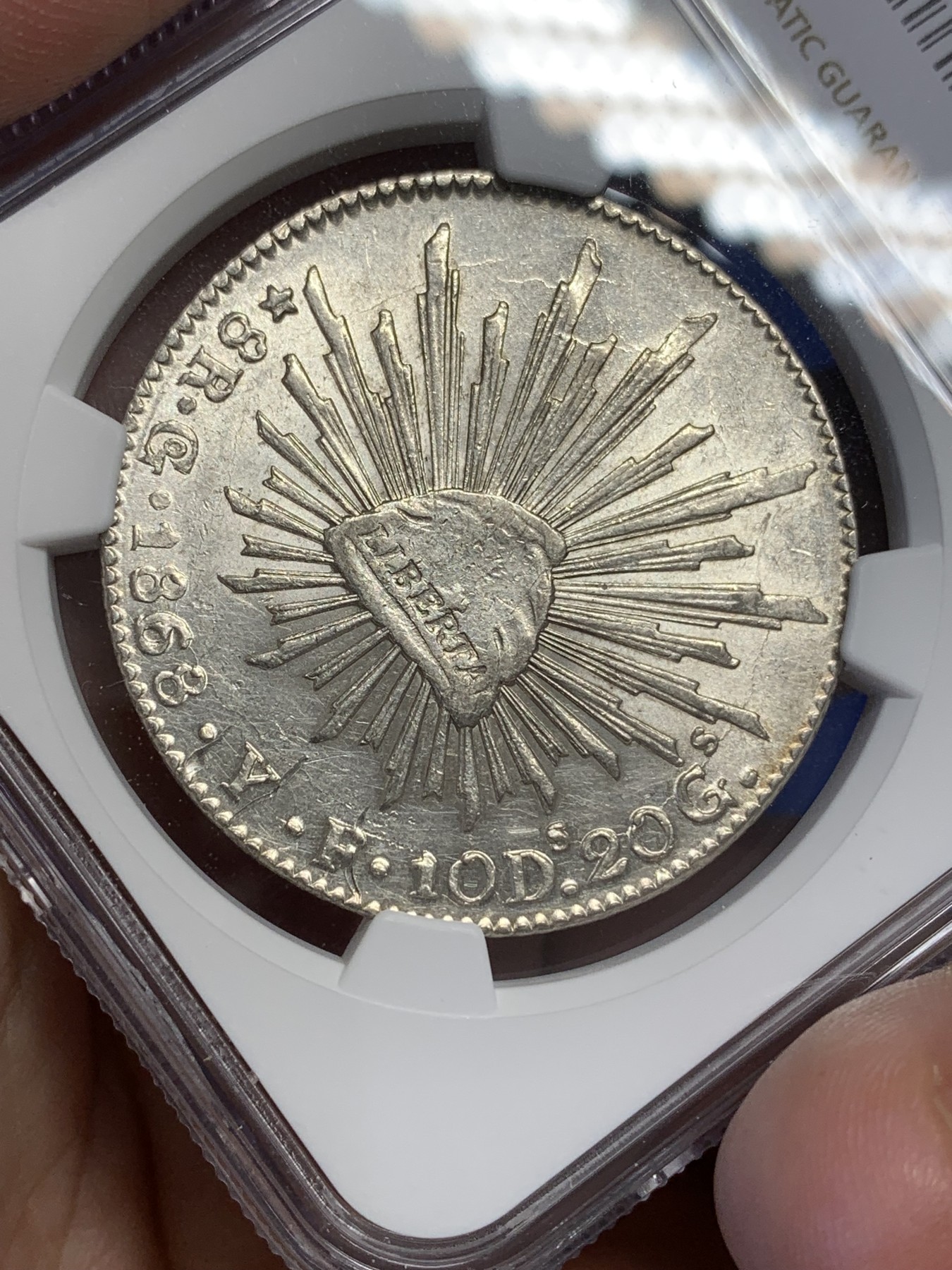 《竞宝斋》第193场-周日，周一 2场 (全场包邮) NGC-UNCD墨西哥1868/58年中期鹰洋 少见骑字版 好状态强转光可惜有道划痕未给分