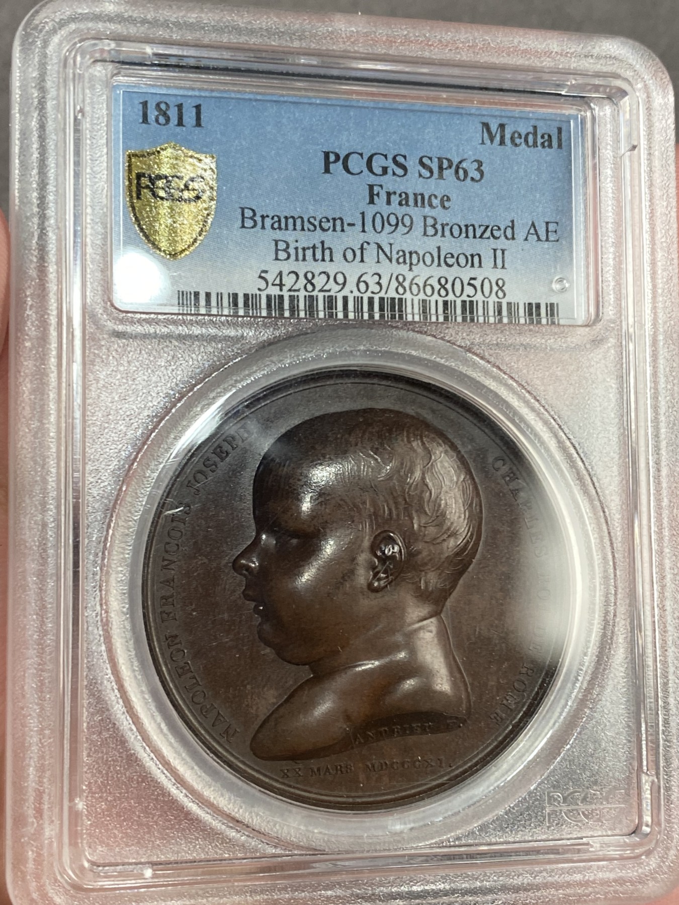 万国钱币拍卖第015期（奢华币章第二季） PCGS SP63 1811年法国拿破仑之子罗马王诞生铜章，状态一流 PCGS封面广告 41MM 