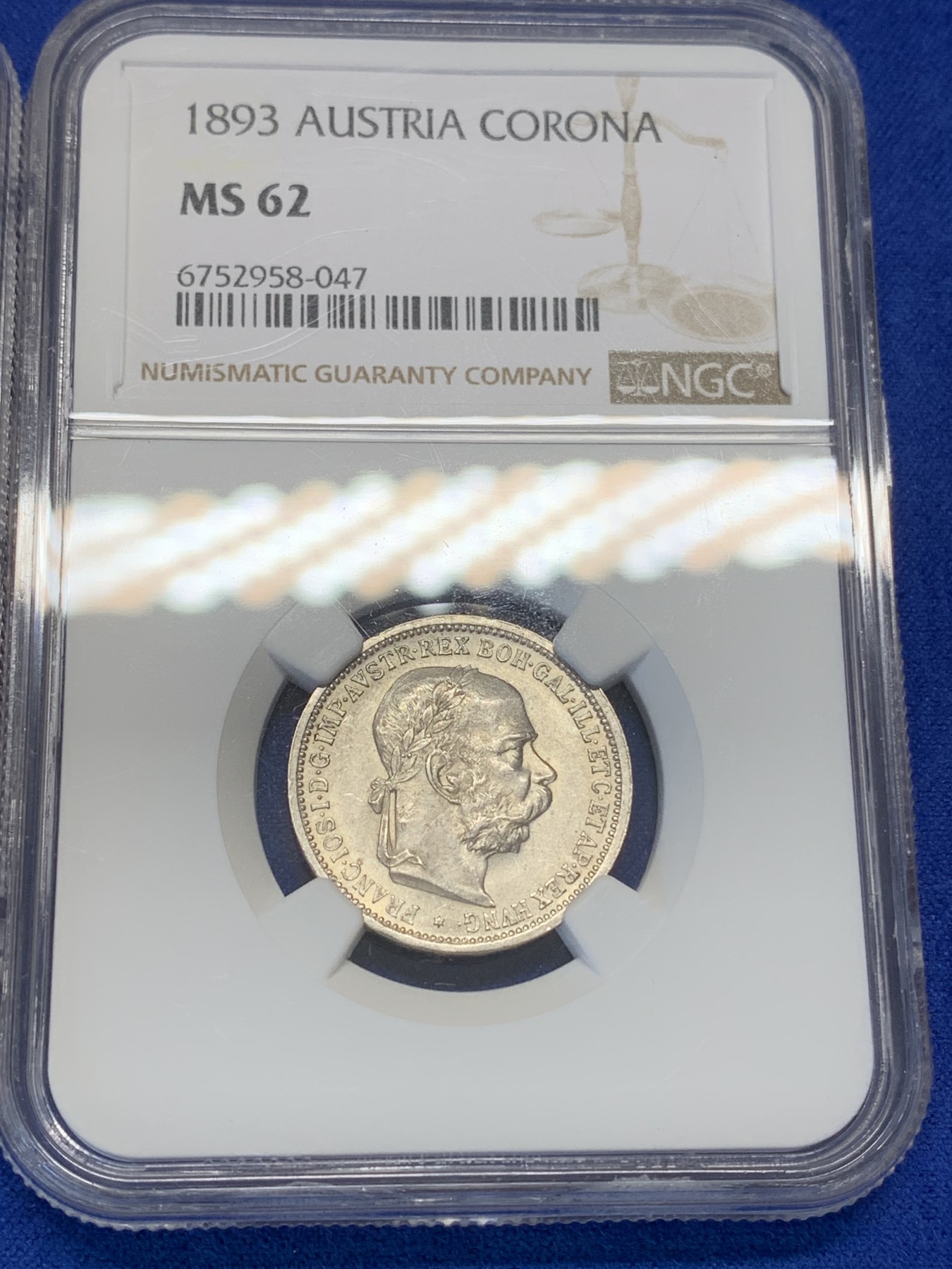 《竞宝斋》第193场-周日，周一 2场 (全场包邮) 奥匈帝国 NGC-MS64匈牙利版1895年1科罗娜银币和 NGC-MS62奥地利版1893年1科罗娜银币一对，转光品相，19世纪的比20世纪的少见很多