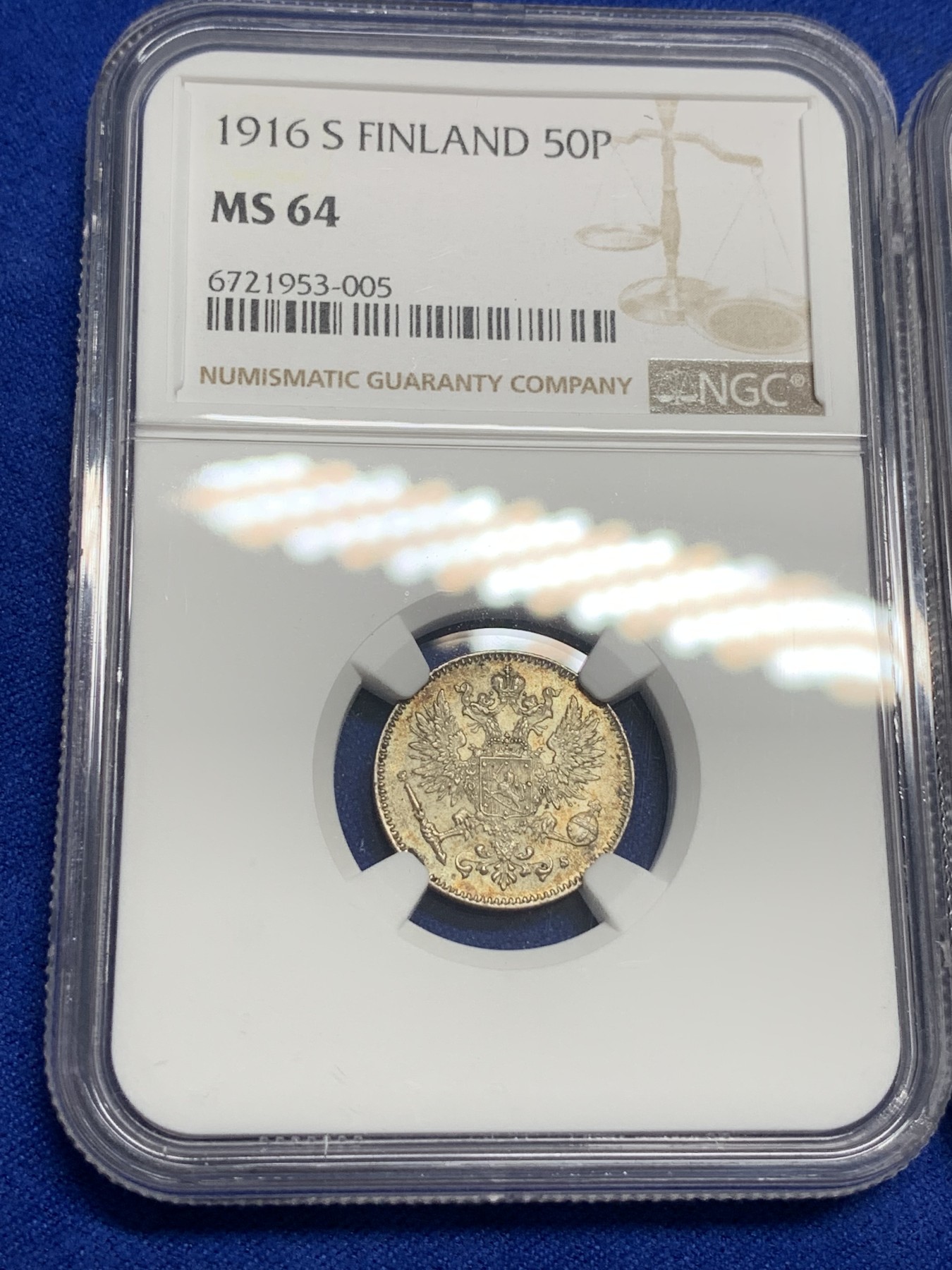 《竞宝斋》第193场-周日，周一 2场 (全场包邮) NGC MS63、MS64 俄占芬兰1916年25、50盆尼小银币一对，25盆尼是金色彩包浆，50芬尼略带淡金包浆，都非常漂亮