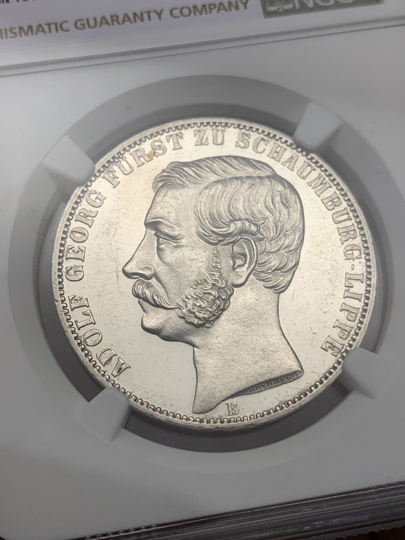 《竞宝斋》第193场-周日，周一 2场 (全场包邮) NGC-UNC 1865年德国绍姆堡利普天使1泰勒银币（发行7000枚的德系小珍）状态好 可以养养包浆试试