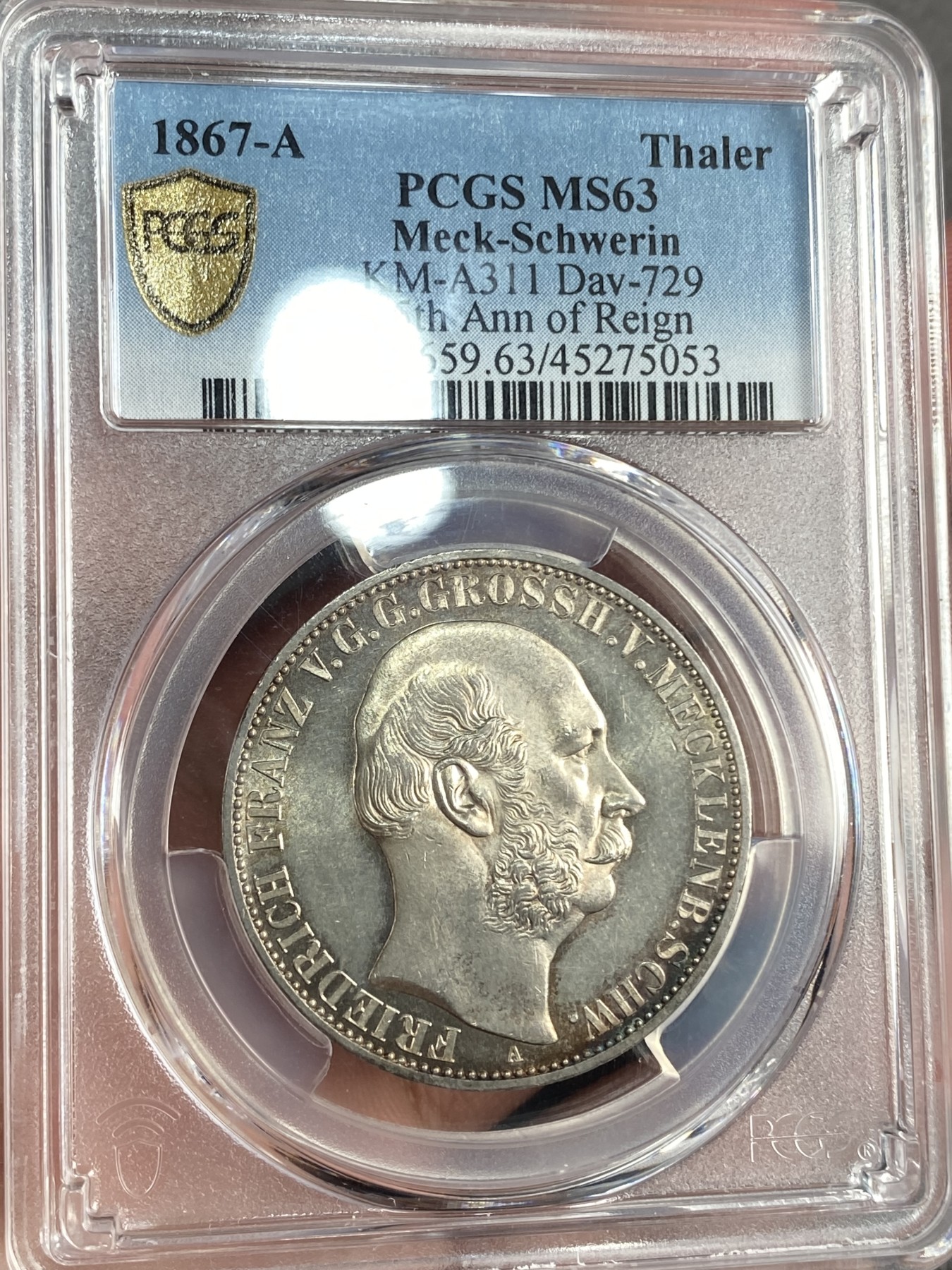 万国钱币拍卖第015期（奢华币章第二季） PCGS MS63 1867年德国梅克伦堡-什未林大公国弗朗茨三世1泰勒 经典小邦盾徽系列 发行量1万枚 无论包浆还是底板的光泽都无与伦比