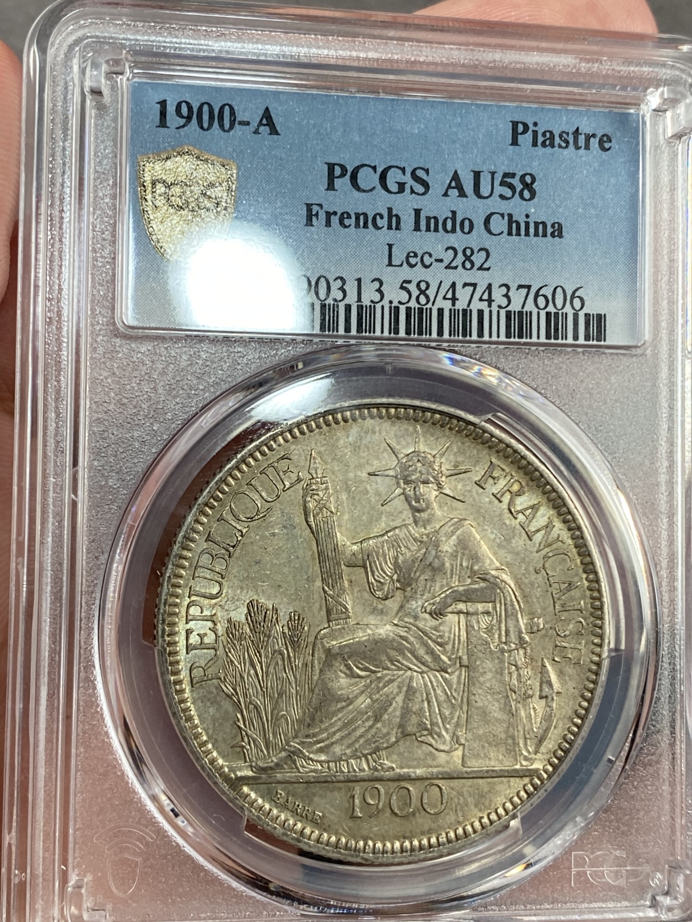万国钱币拍卖第015期（奢华币章第二季） PCGS AU58 1900年法属印支坐洋 高点的细节与五色幻彩无不表明这是一枚值得收藏的藏品