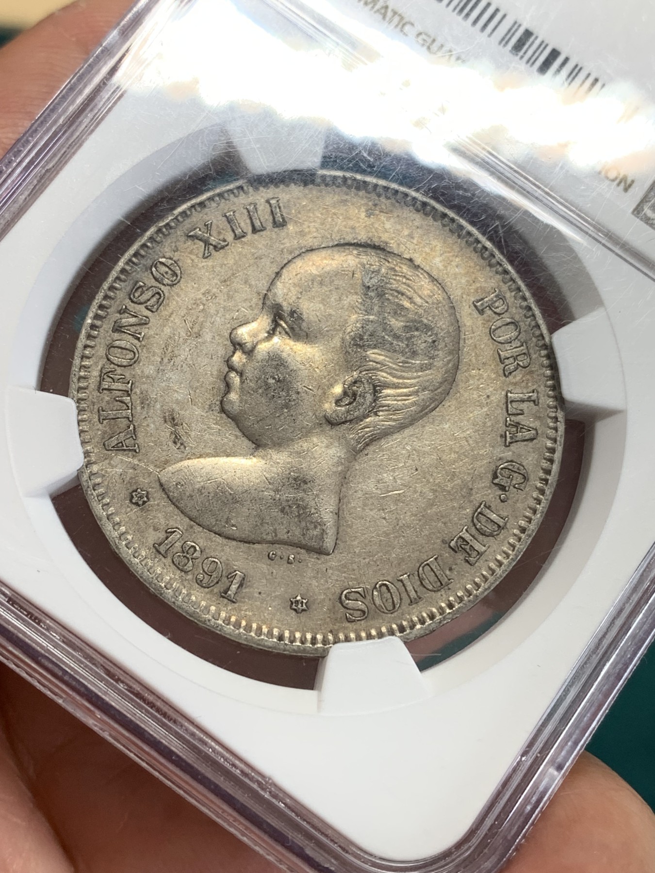 《竞宝斋》第193场-周日，周一 2场 (全场包邮) NGC AU 西班牙1891年小光头5比塞塔银币 磨损小 发丝可见 难得好品