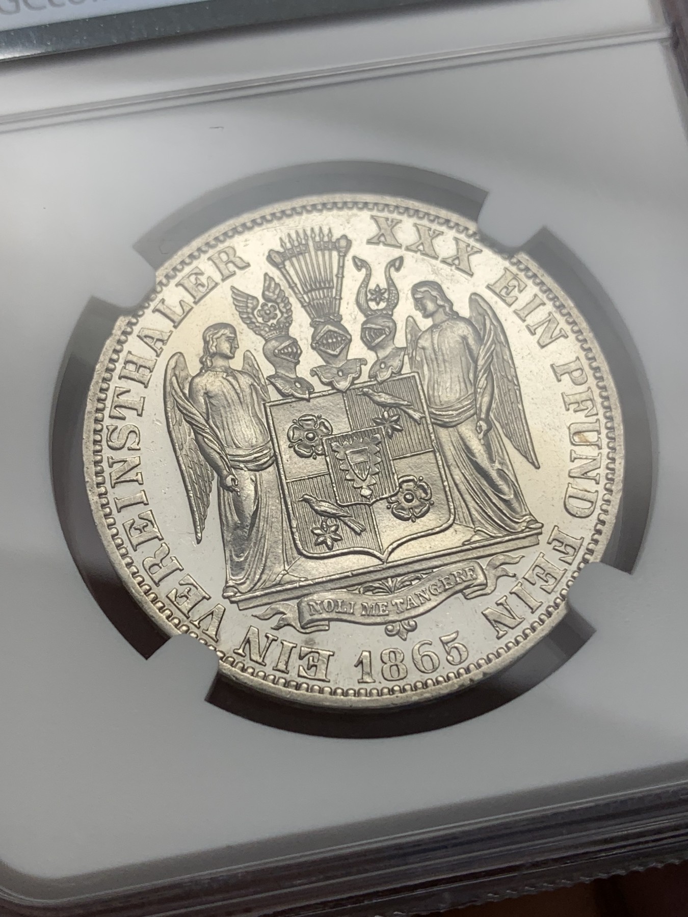 《竞宝斋》第193场-周日，周一 2场 (全场包邮) NGC-UNC 1865年德国绍姆堡利普天使1泰勒银币（发行7000枚的德系小珍）状态好 可以养养包浆试试