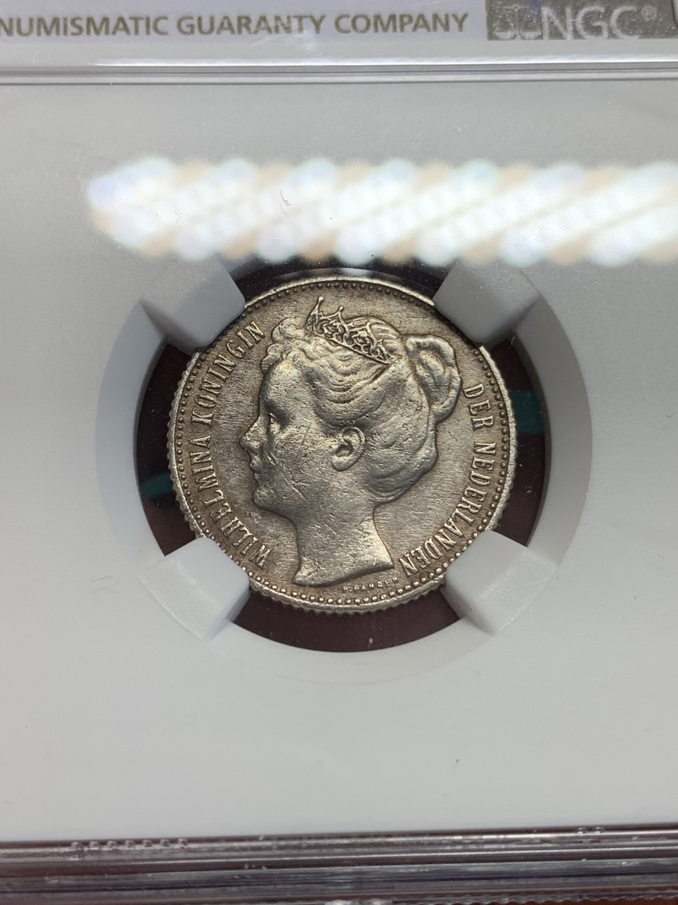 《竞宝斋》第193场-周日，周一 2场 (全场包邮) NGC-AUD 荷兰 1905年 威廉明娜萝莉头1/2G 银币 盘发头少见