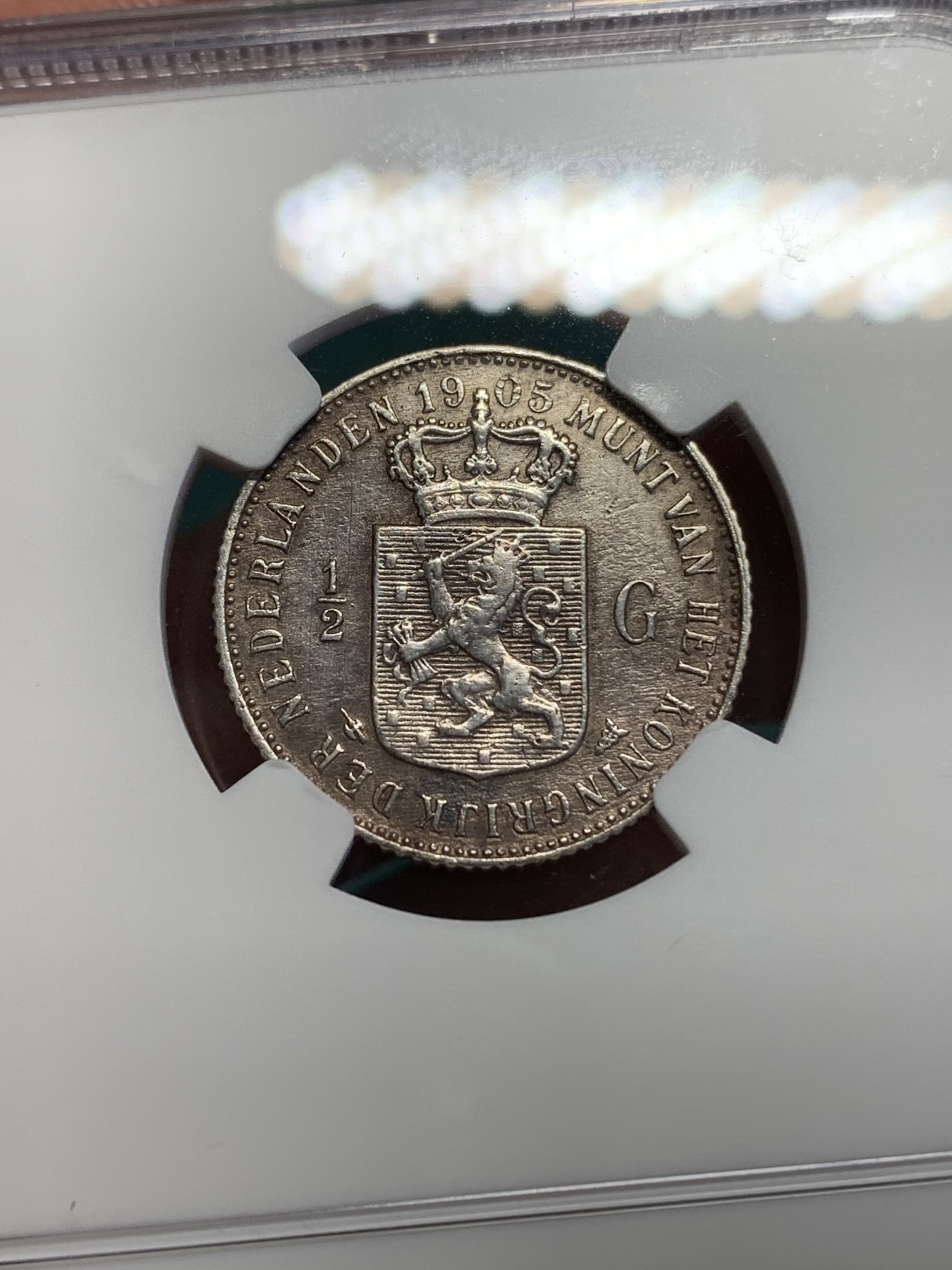 《竞宝斋》第193场-周日，周一 2场 (全场包邮) NGC-AUD 荷兰 1905年 威廉明娜萝莉头1/2G 银币 盘发头少见