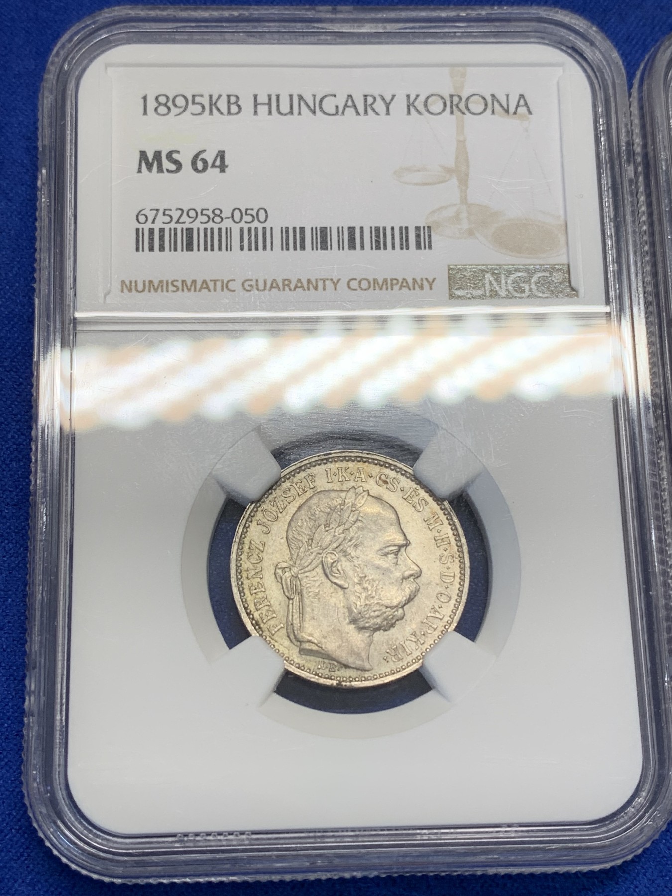 《竞宝斋》第193场-周日，周一 2场 (全场包邮) 奥匈帝国 NGC-MS64匈牙利版1895年1科罗娜银币和 NGC-MS62奥地利版1893年1科罗娜银币一对，转光品相，19世纪的比20世纪的少见很多